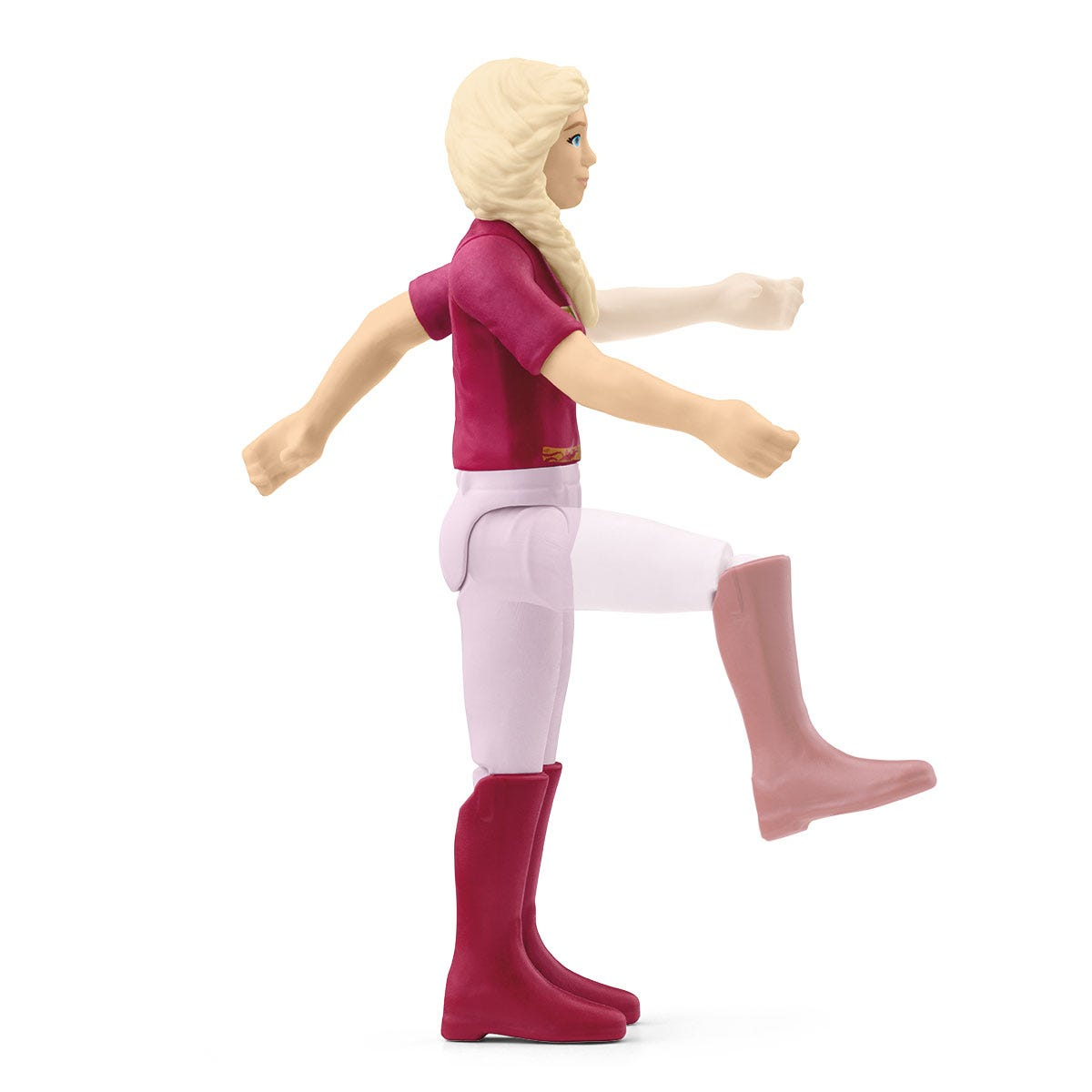 A toy figure of a girl in riding attire. She has blonde hair, a red shirt, white pants, and red boots. She's in motion.