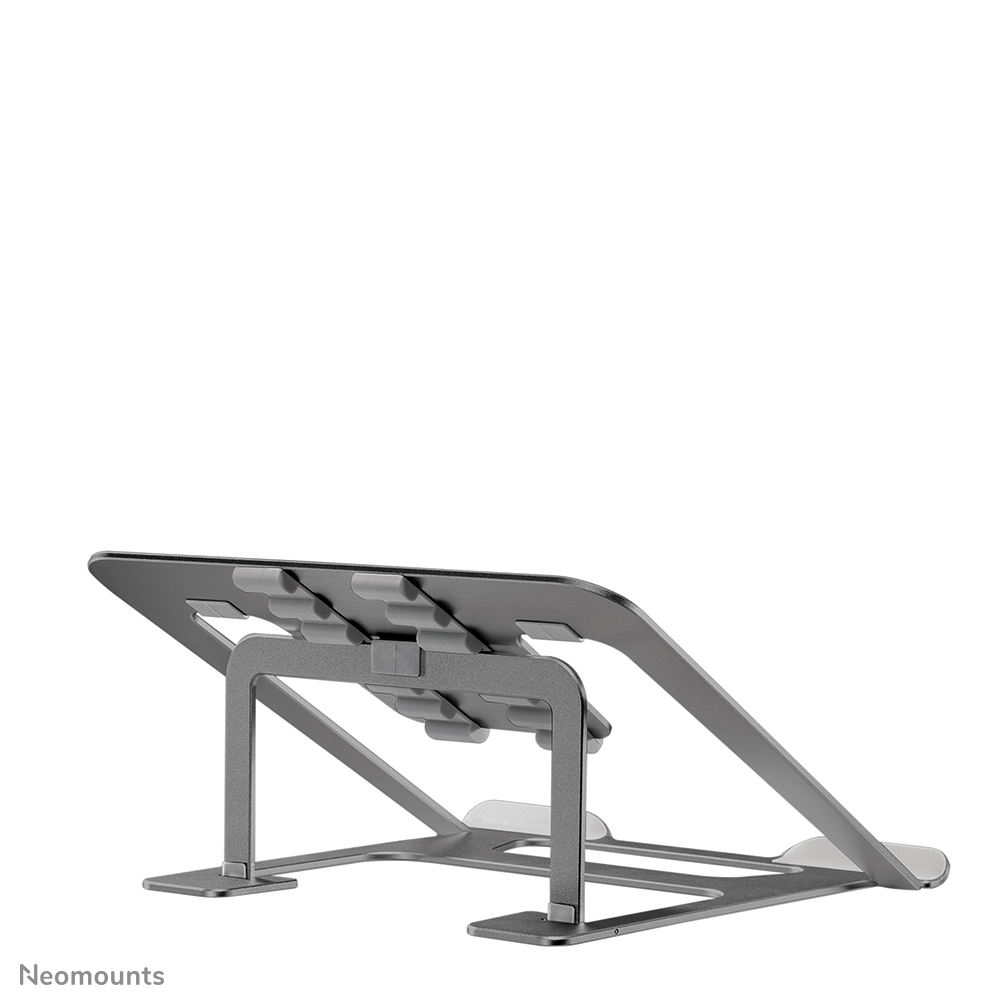 A gray laptop stand. The stand is angled, with supports for the laptop and a base. The background is white.
