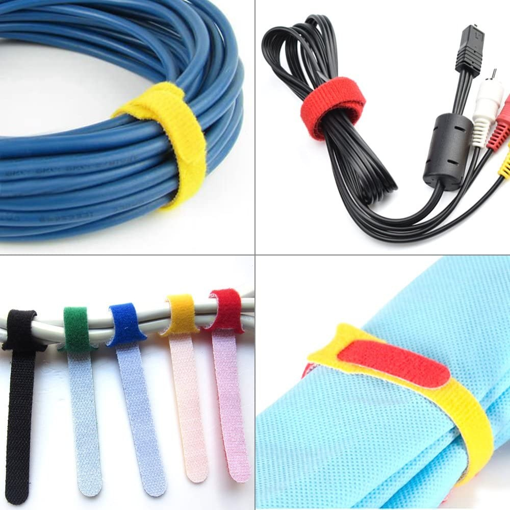 Das Bild zeigt gebündelte Kabel und Stoff, die mit Klettbändern in verschiedenen Farben befestigt sind: gelb, rot, grün, blau und rosa.