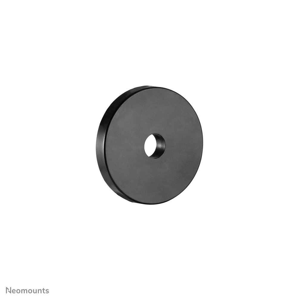 Une plaque métallique circulaire gris foncé avec un trou au centre. La plaque est légèrement inclinée sur fond blanc.