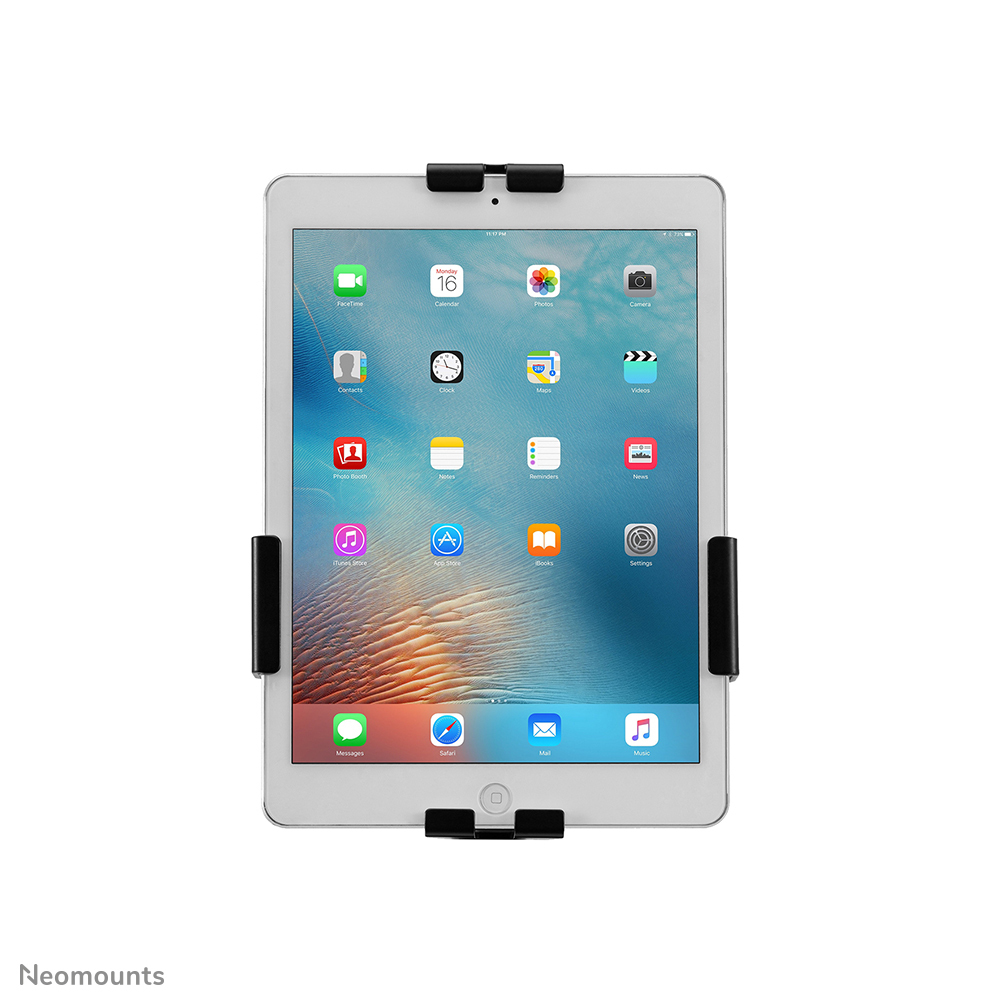 An iPad in a black holder, displaying app icons. The screen shows the date as Monday 16. The background is white.