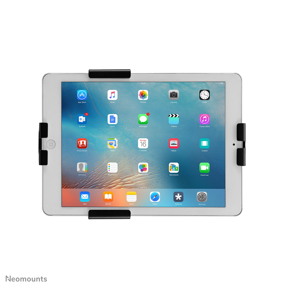 An iPad in a black holder, displaying apps on the screen. The background is white.