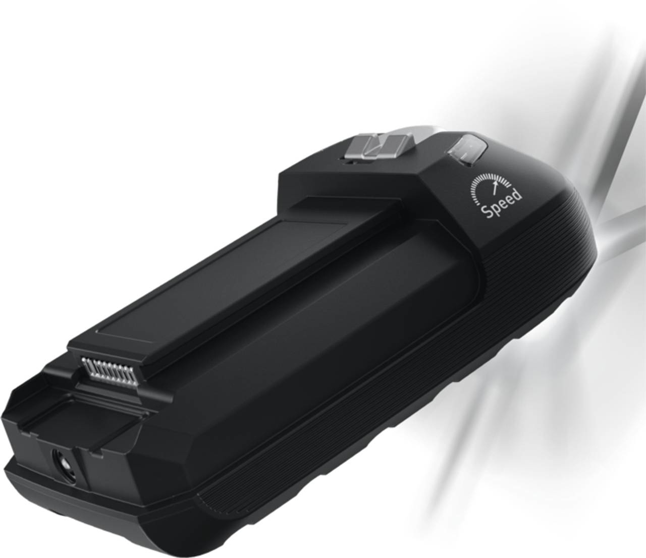 Czarne urządzenie z pokrętłem 'Speed', długą górą i różnymi przyciskami. Na białym tle z efektem świetlnym.