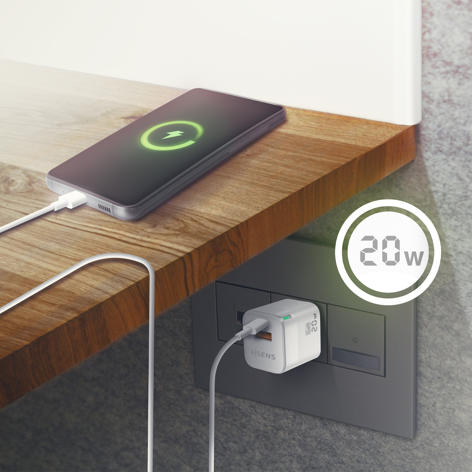 Un teléfono cargando en una superficie de madera. Un cargador está enchufado a una toma de corriente. La pantalla muestra un símbolo de carga.