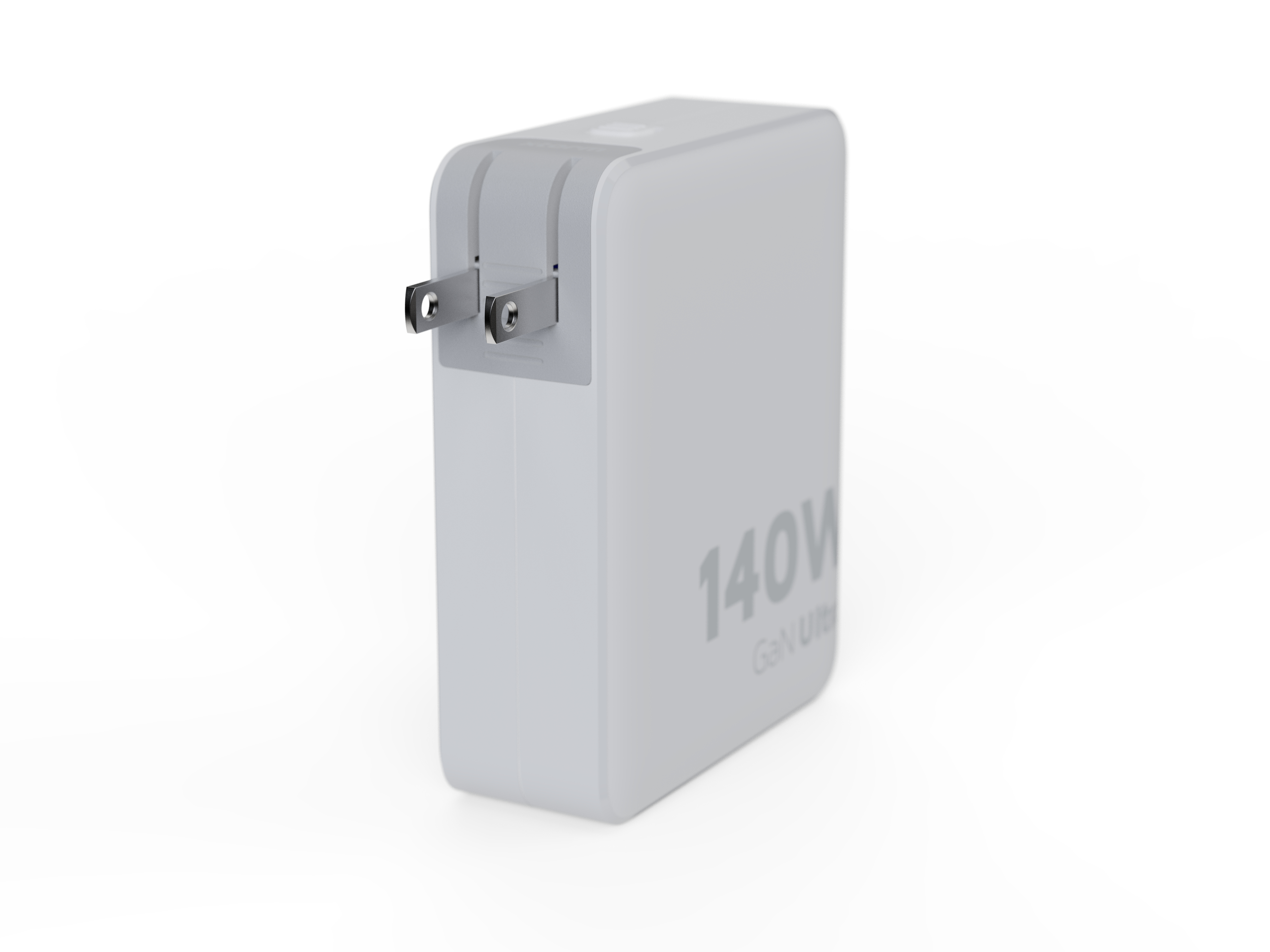 Un chargeur blanc 140W GaN Ultra avec broches de prise US sur fond blanc.