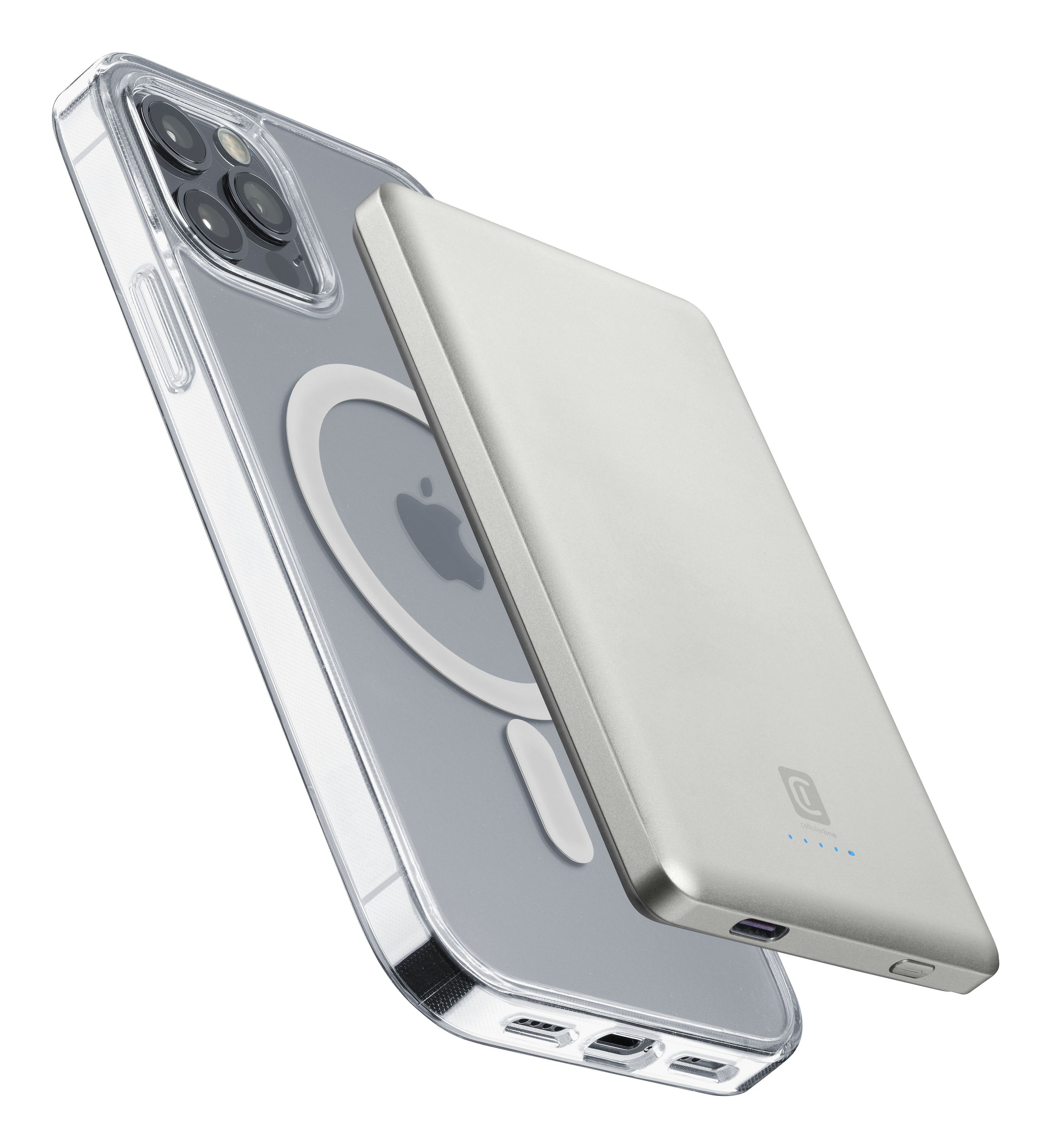 Un iPhone con una funda transparente y un banco de energía plateado. La funda tiene un anillo blanco. El banco de energía está a la derecha.