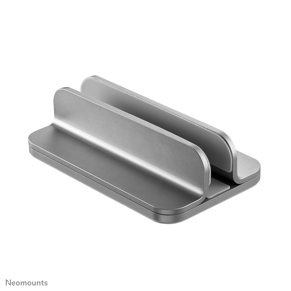 Silver laptop stand. It has two raised supports for the laptop and a flat base. The background is white.