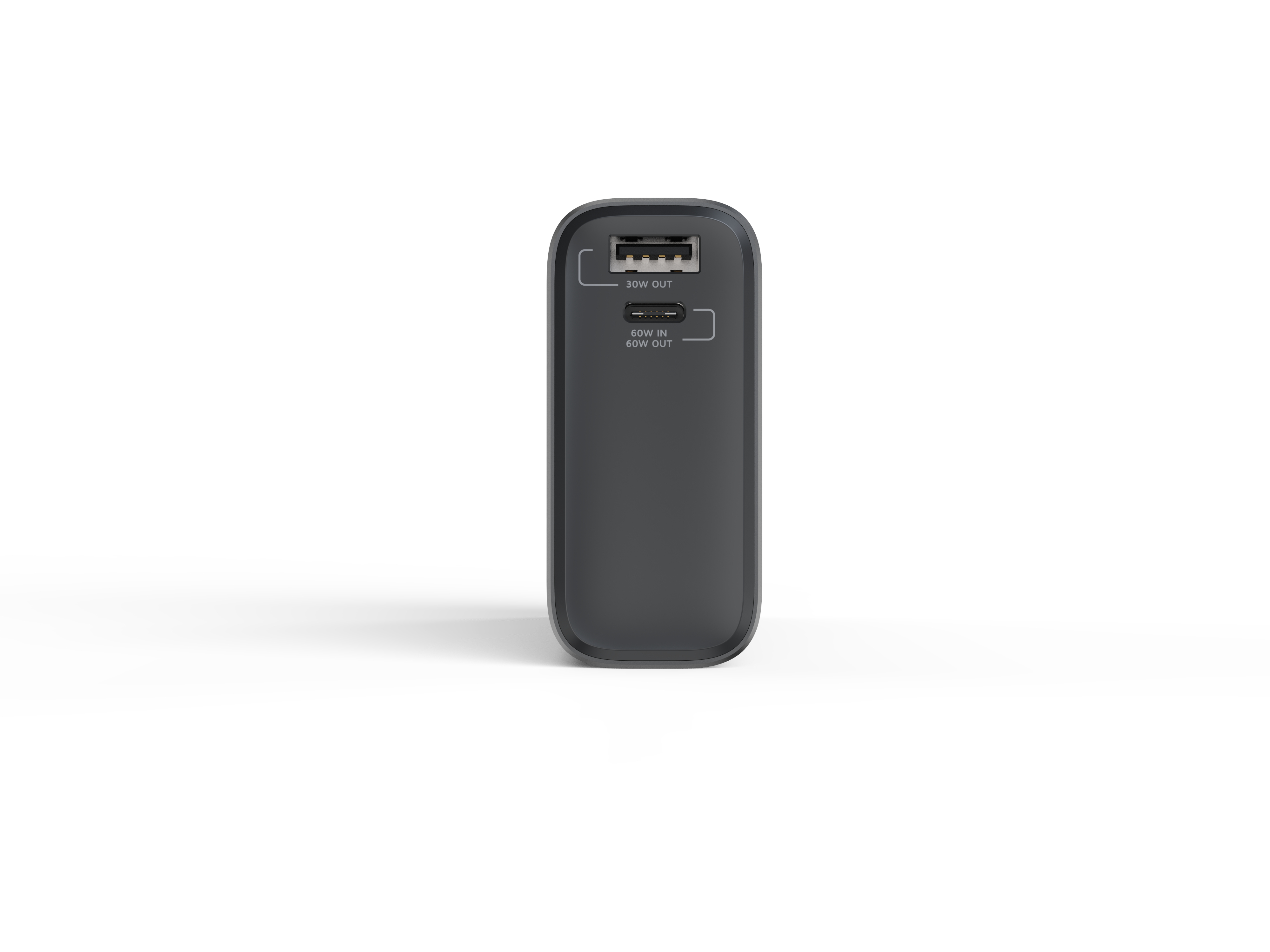 Eine dunkelgraue Powerbank steht aufrecht auf einer weißen Oberfläche, mit Anschlüssen mit der Aufschrift '30W OUT' und '60W IN/OUT'.
