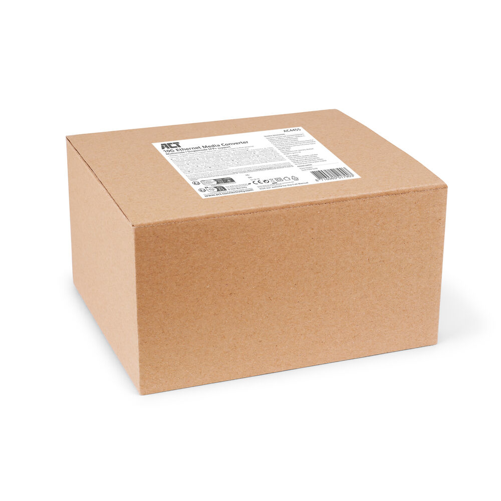 Brązowe kartonowe pudełko na białej powierzchni. Na górze etykieta z tekstem i logo, prawdopodobnie informacje o produkcie.