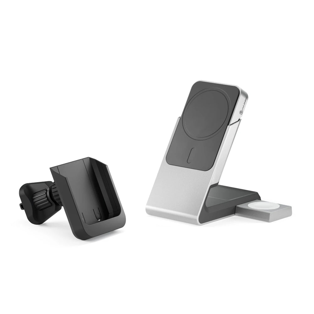 Due supporti per la ricarica del telefono. Uno nero, uno argento. Entrambi hanno fessure per telefoni. Lo sfondo è bianco.