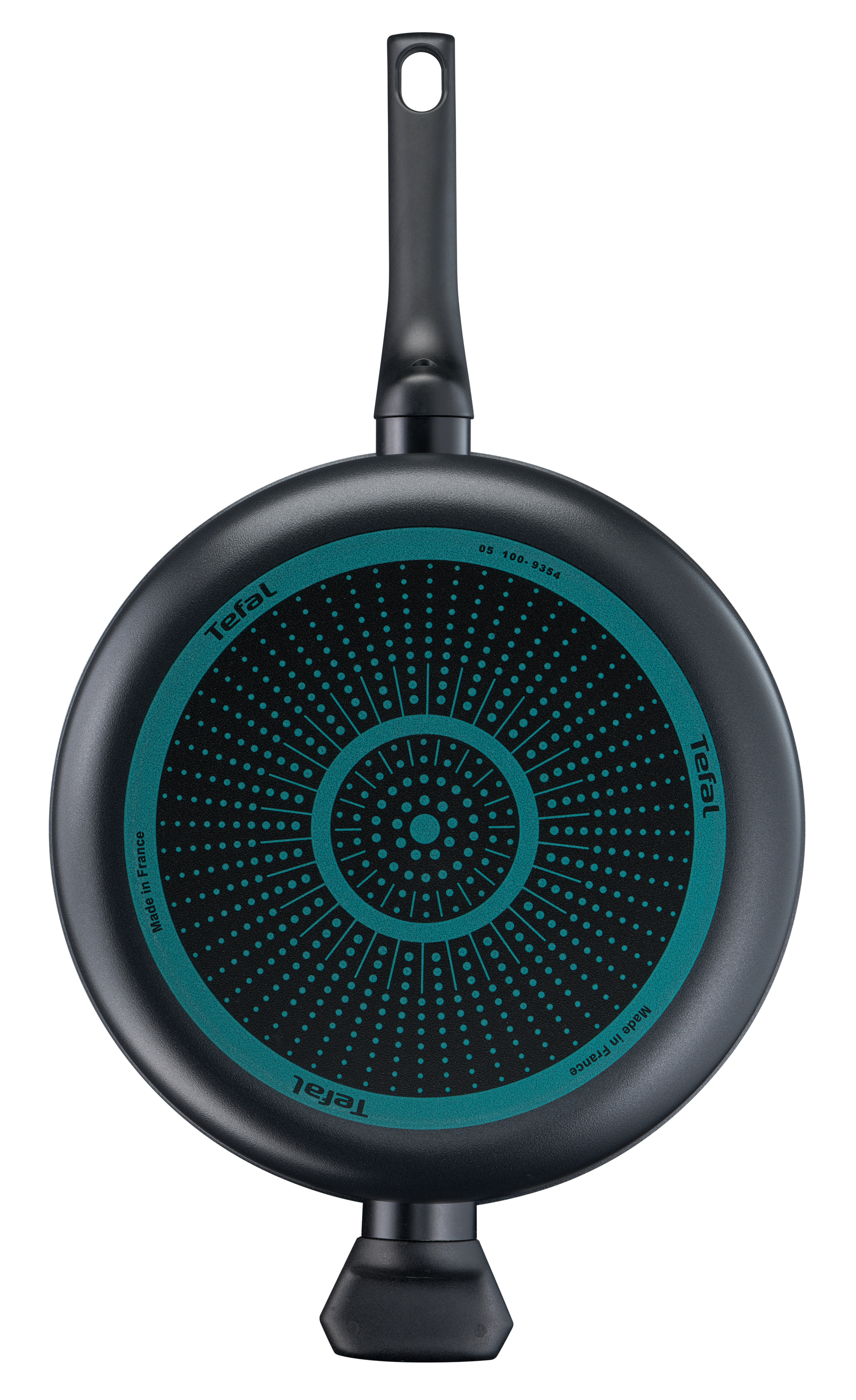 Czarna podstawa patelni Tefal. Ma turkusowy wzór w środku i czarny uchwyt. Widoczne są napisy 'Made in France'.