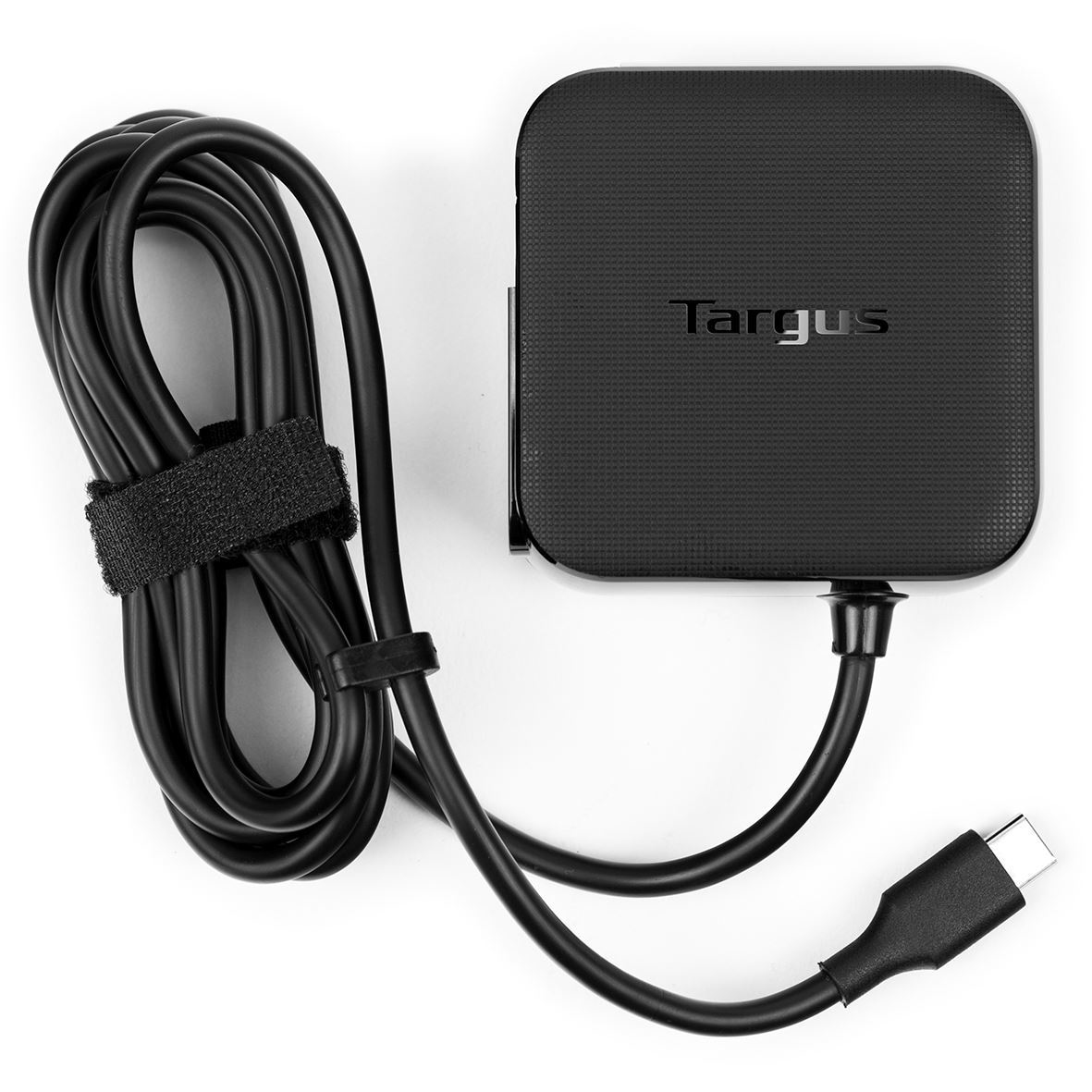 A black Targus power adapter with a USB-C connector and a coiled cable secured by a velcro strap, on a white background.