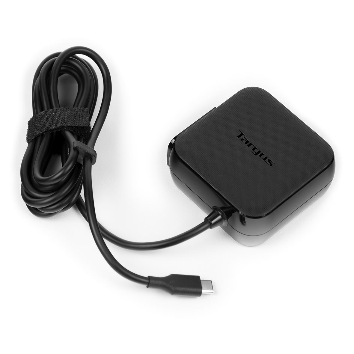 A black Targus laptop charger with a USB-C connector. The cord is bundled and secured with a velcro strap. The background is white.