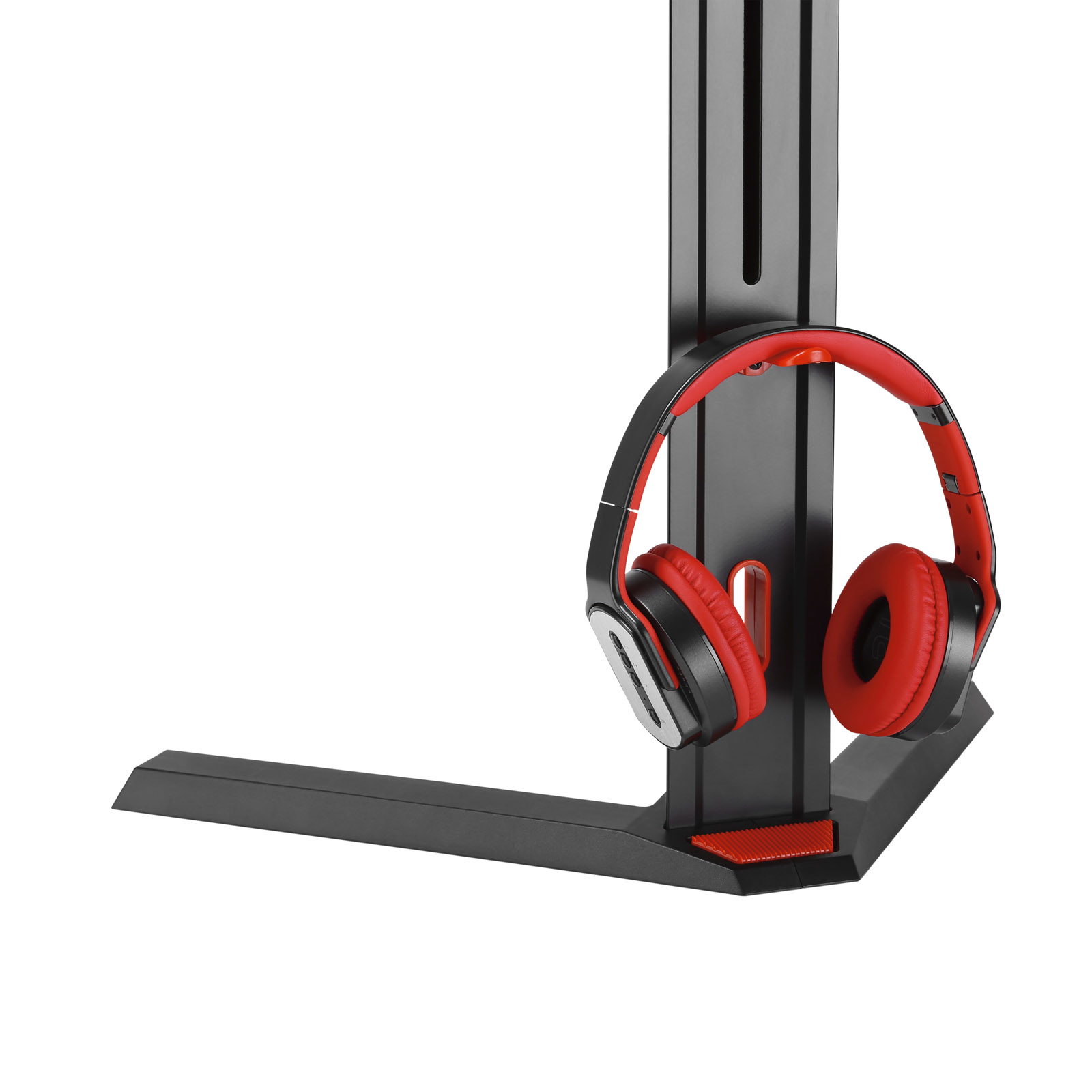 Soporte negro para auriculares con auriculares rojos. El soporte tiene una base y un soporte vertical. Los auriculares están en el soporte.