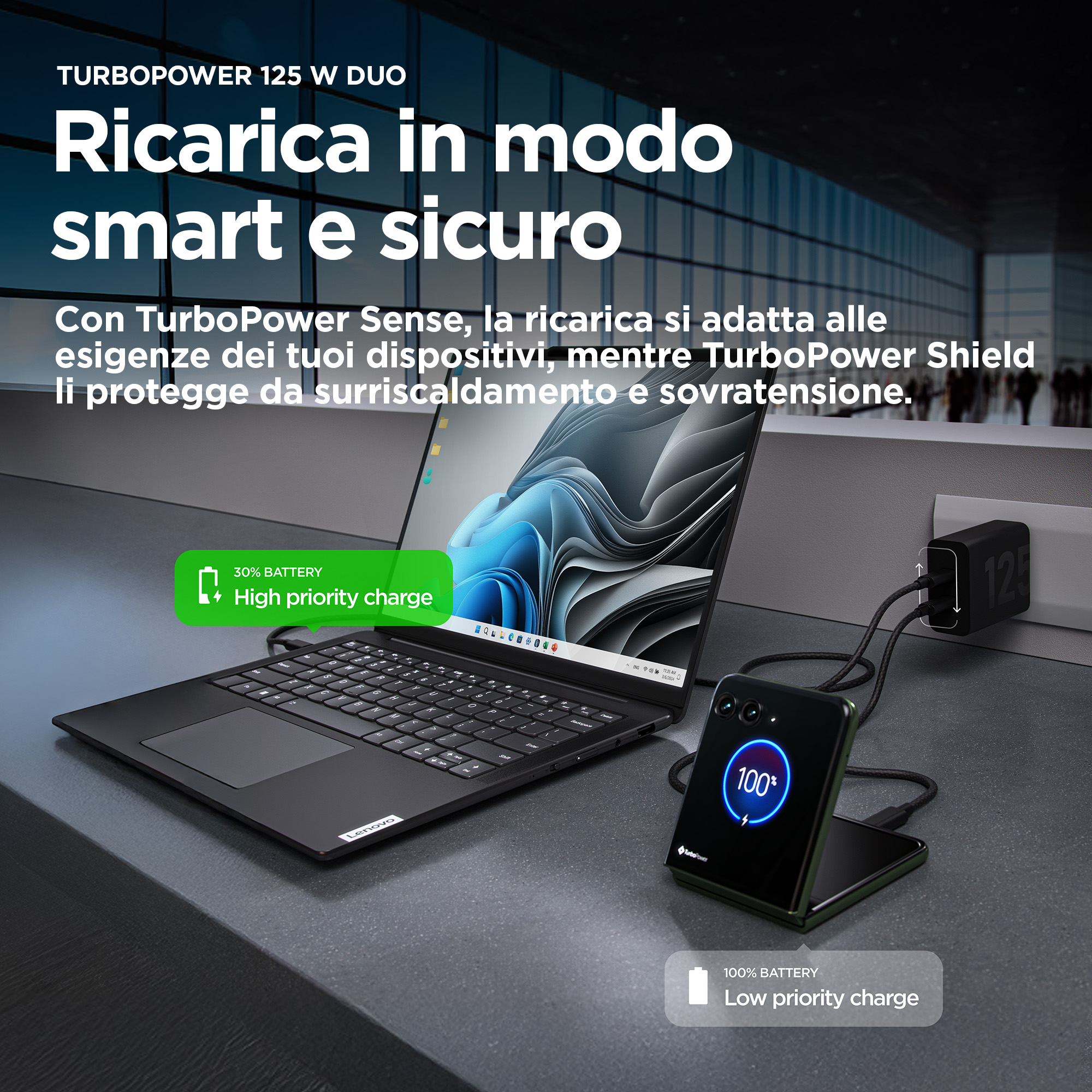 Un ordinateur portable et un téléphone se chargent. Un chargeur est branché au mur. Le texte indique TurboPower 125 W Duo.