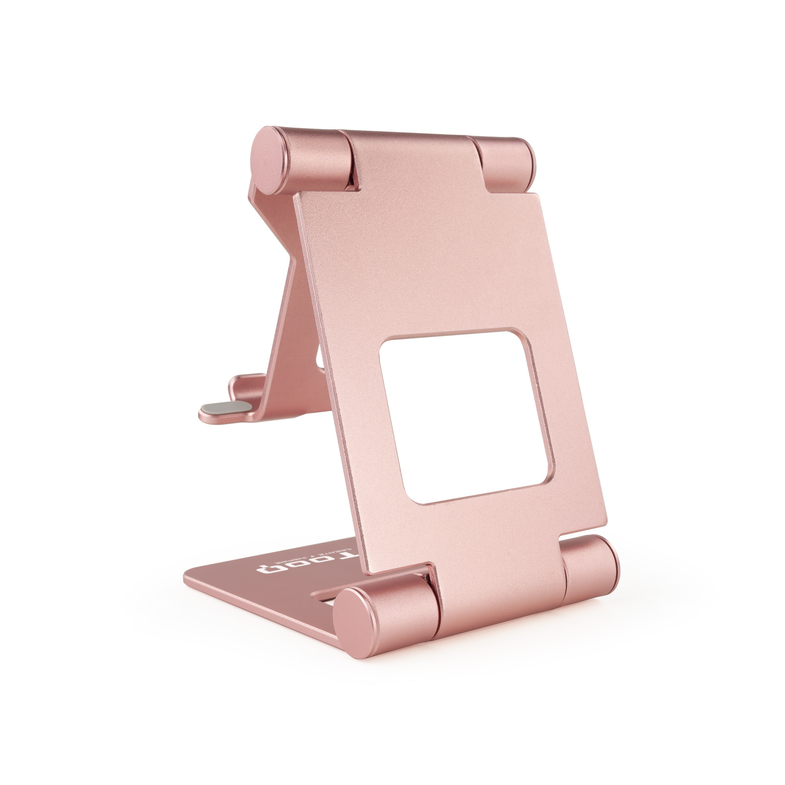 Soporte de teléfono oro rosa. Tiene una base, un panel central con un recorte cuadrado y dos cilindros para bisagras.