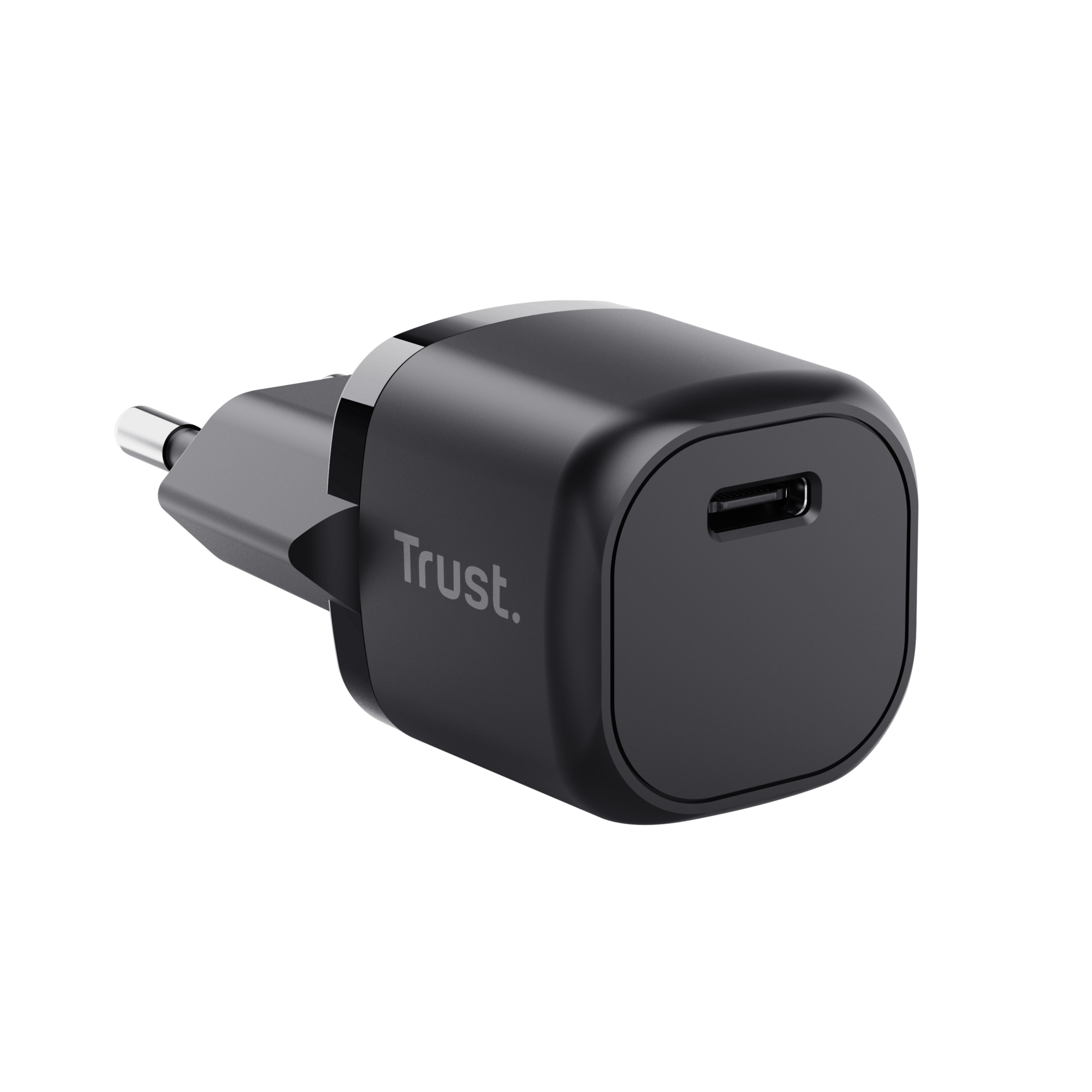 Cargador USB-C negro Trust. Tiene un enchufe a la izquierda y un puerto USB-C al frente.