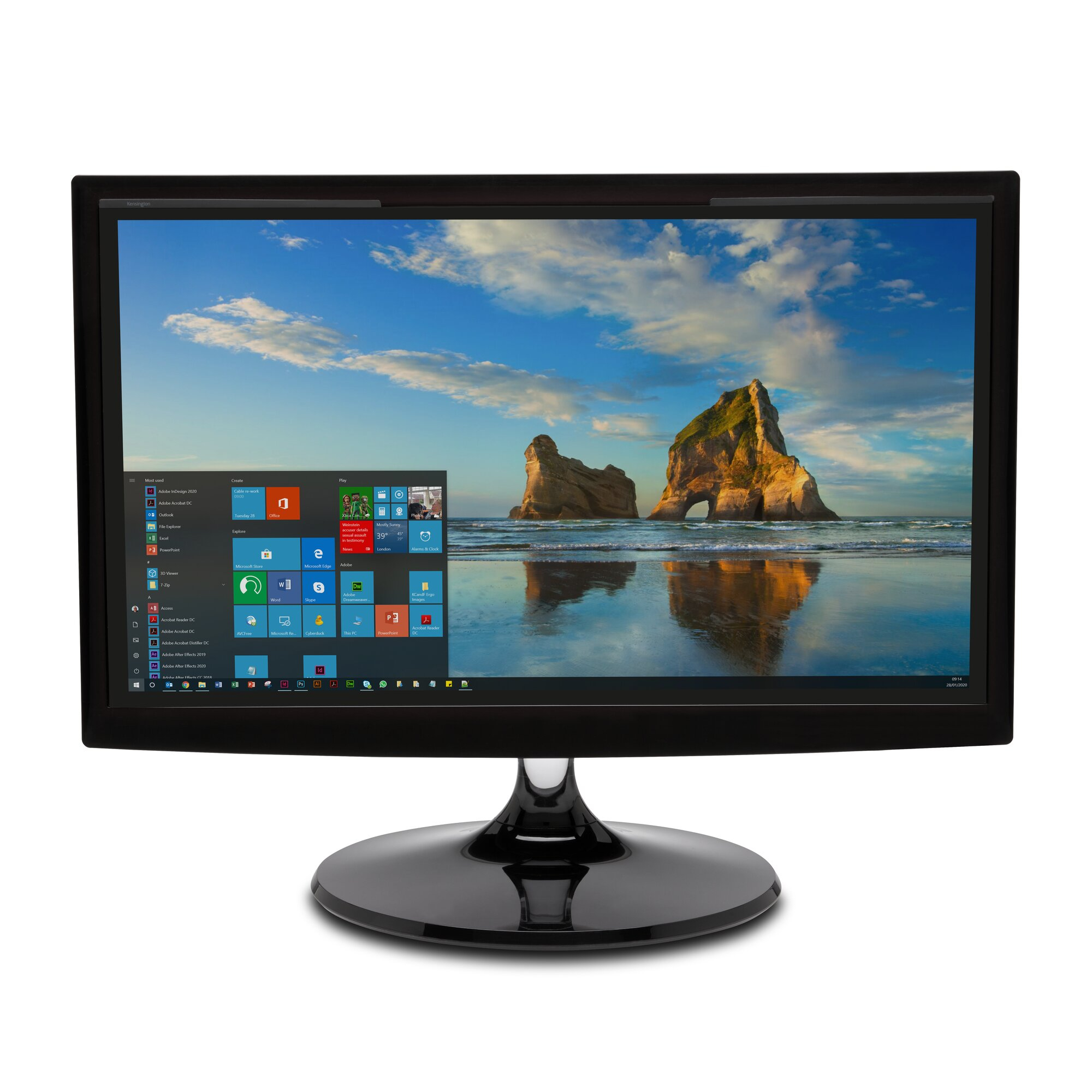 Un monitor de computadora muestra una escena de playa con formaciones rocosas bajo un cielo nublado. La pantalla muestra la interfaz de Windows.