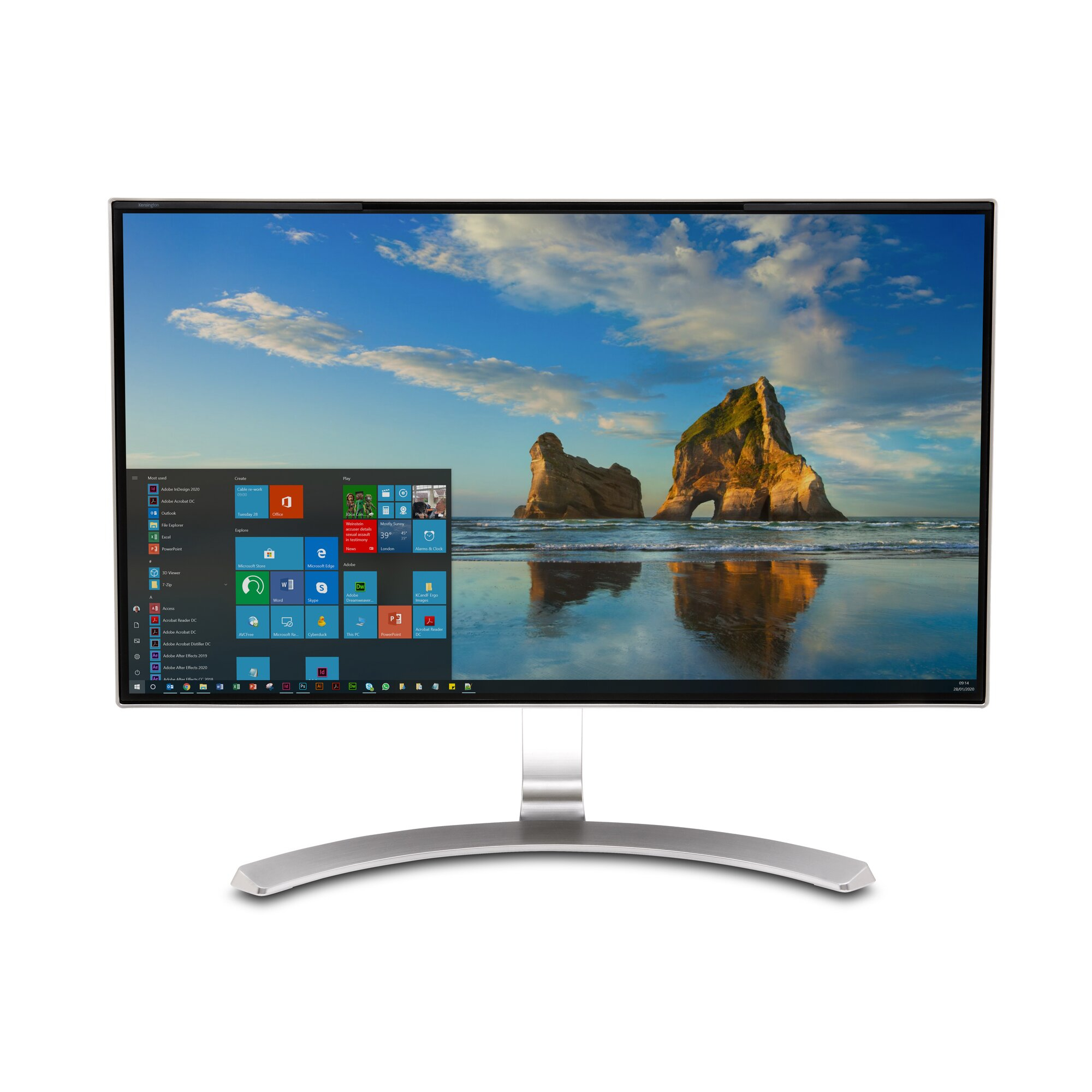 Un monitor de computadora muestra una escena de playa con formaciones rocosas y una interfaz de Windows.