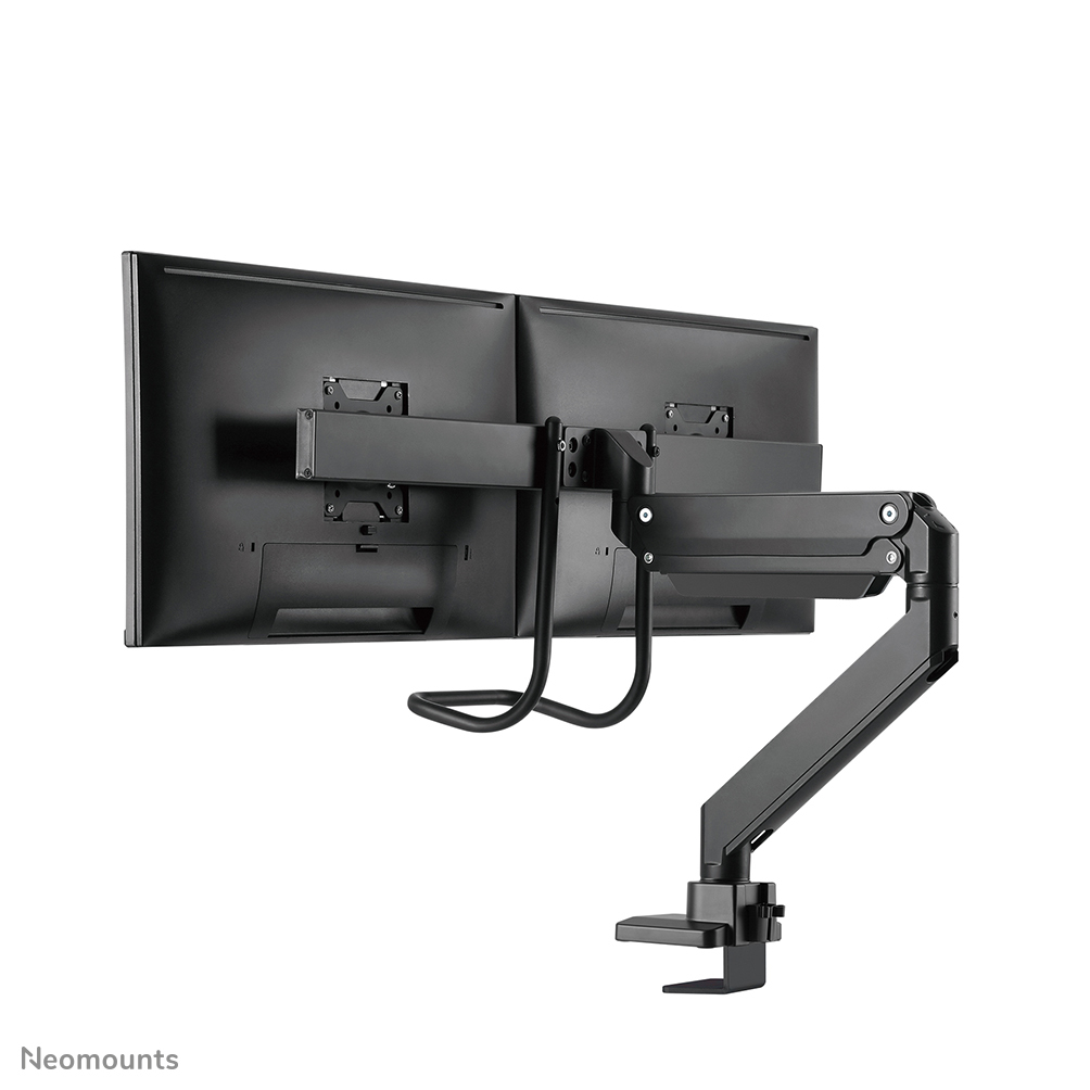 A dual monitor mount with two black monitors. A black articulating arm supports the monitors, attached to a desk clamp.