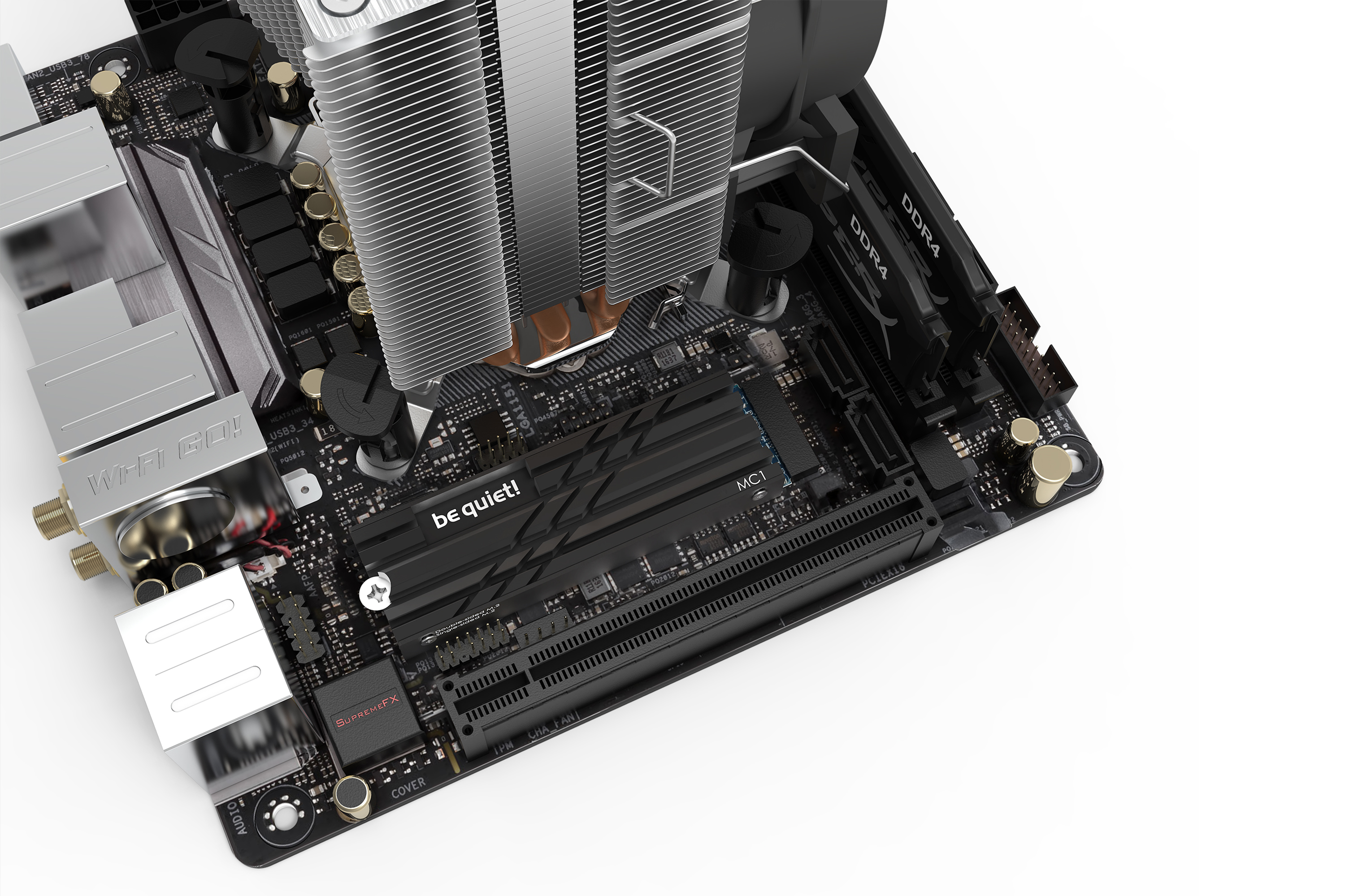 A computer motherboard with a CPU cooler, RAM, and various components. The background is white.