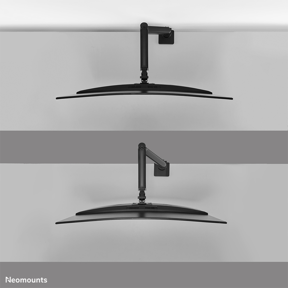 Two black curved computer monitors are mounted on the wall. Each is held by a black adjustable arm.