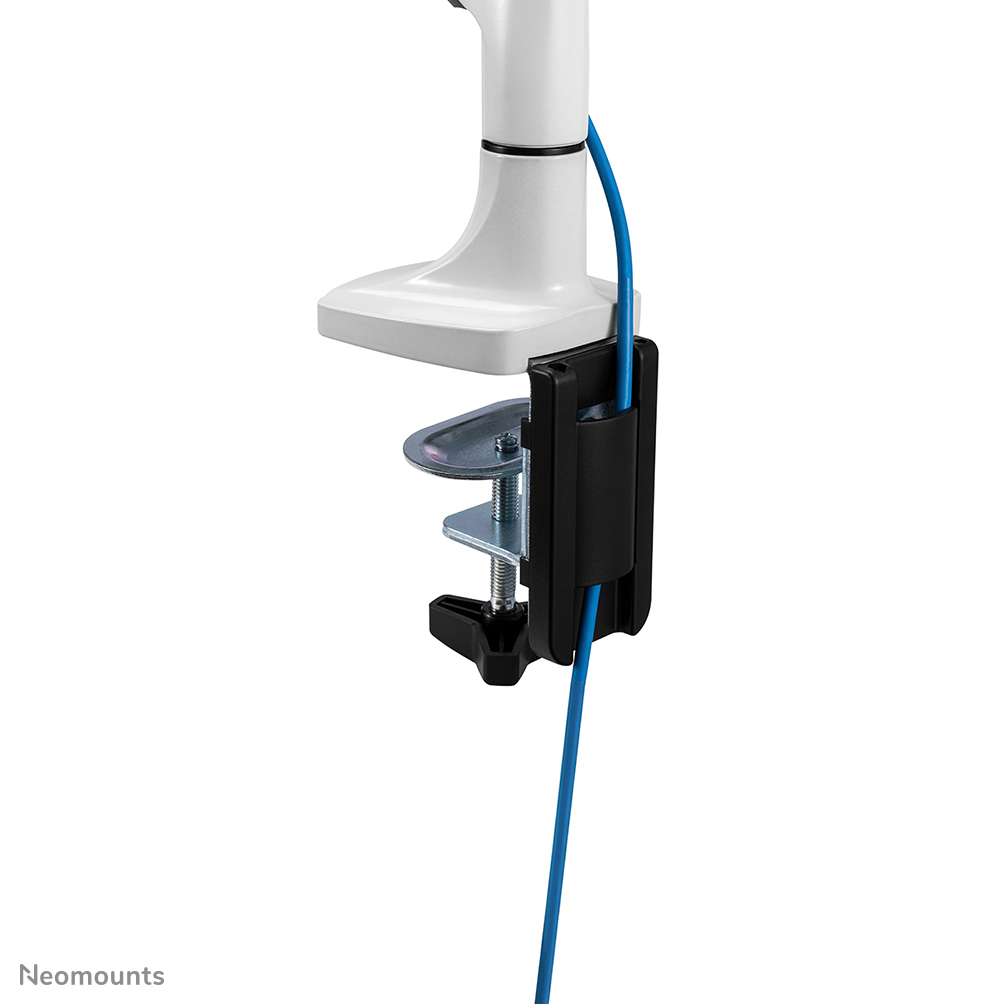 A white monitor arm with a black clamp. A blue cable runs through the clamp. The clamp is attached to a metal base.