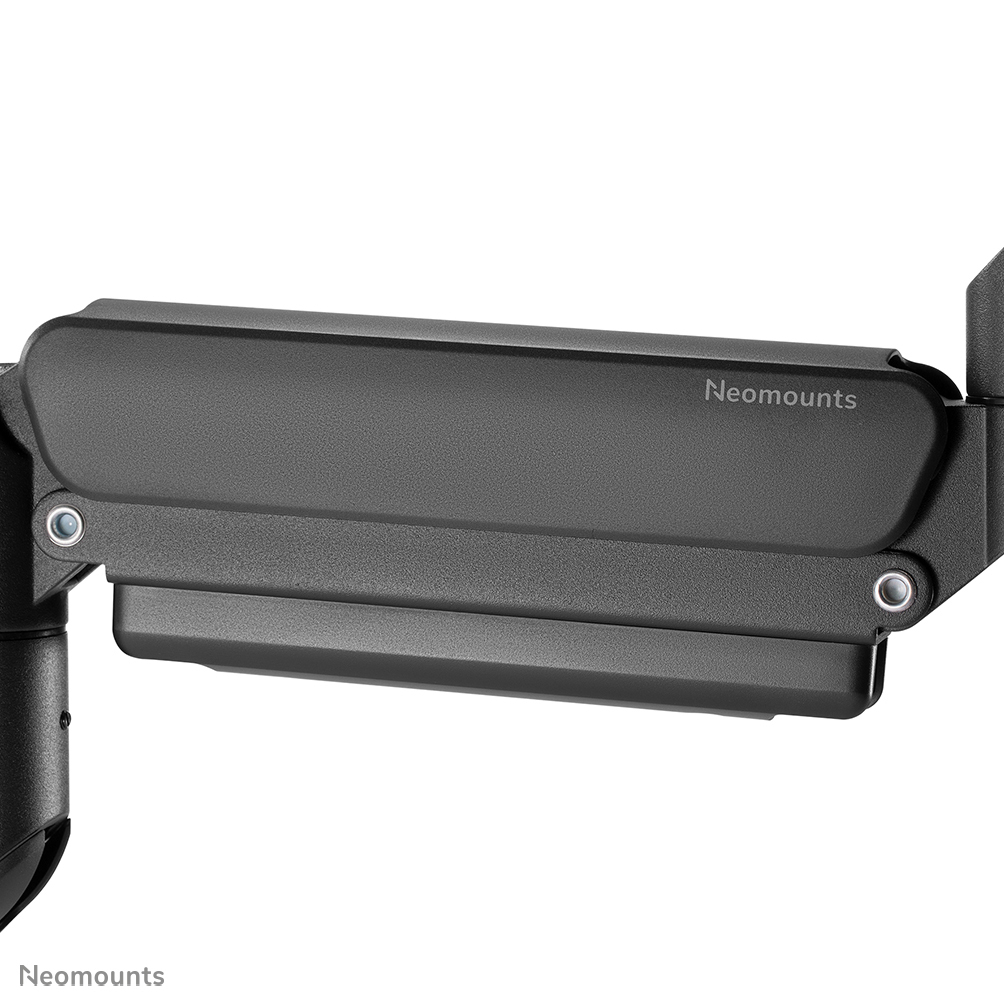 A close-up of a black Neomounts monitor arm. The arm has a rectangular shape with the brand name on it. Screws are visible.