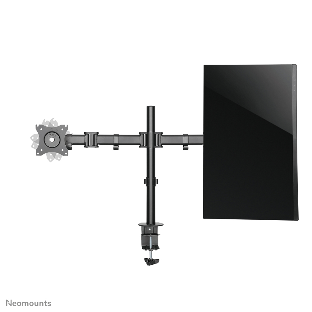 A black monitor is held by a black mount. The mount has adjustable arms and a clamp for securing it to a desk.