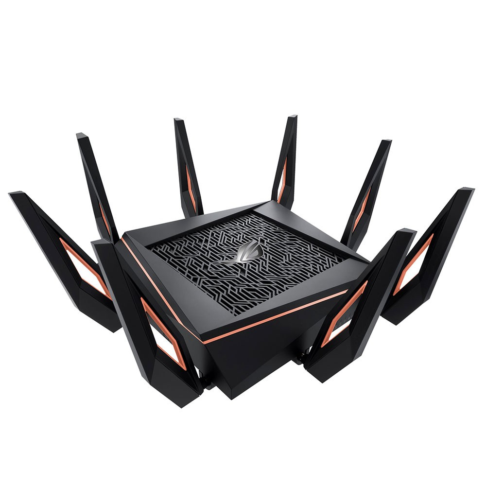 Czarny router z wieloma antenami, miedzianymi akcentami i geometrycznym wzorem. Górna część ma wzorzystą powierzchnię i logo.