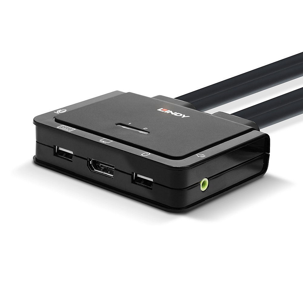 Een zwart LINDY-apparaat met poorten. Het heeft twee zwarte kabels. Het apparaat heeft USB-, HDMI- en audiopoorten.