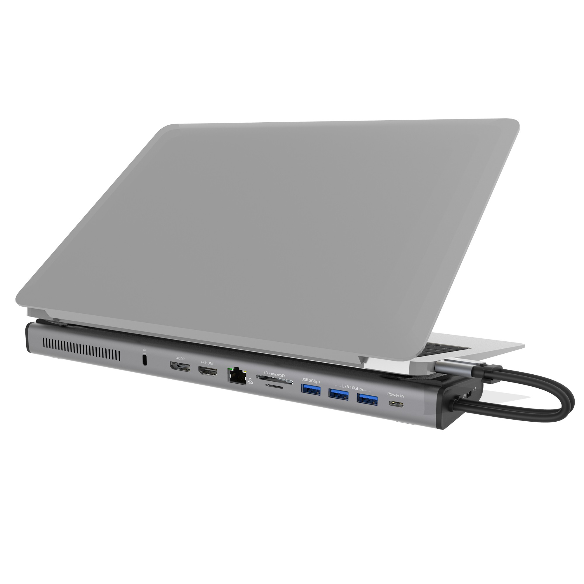 Un portátil gris sobre una estación de acoplamiento. Puertos: HDMI, USB y ranura para tarjetas SD. Cable negro conectado.