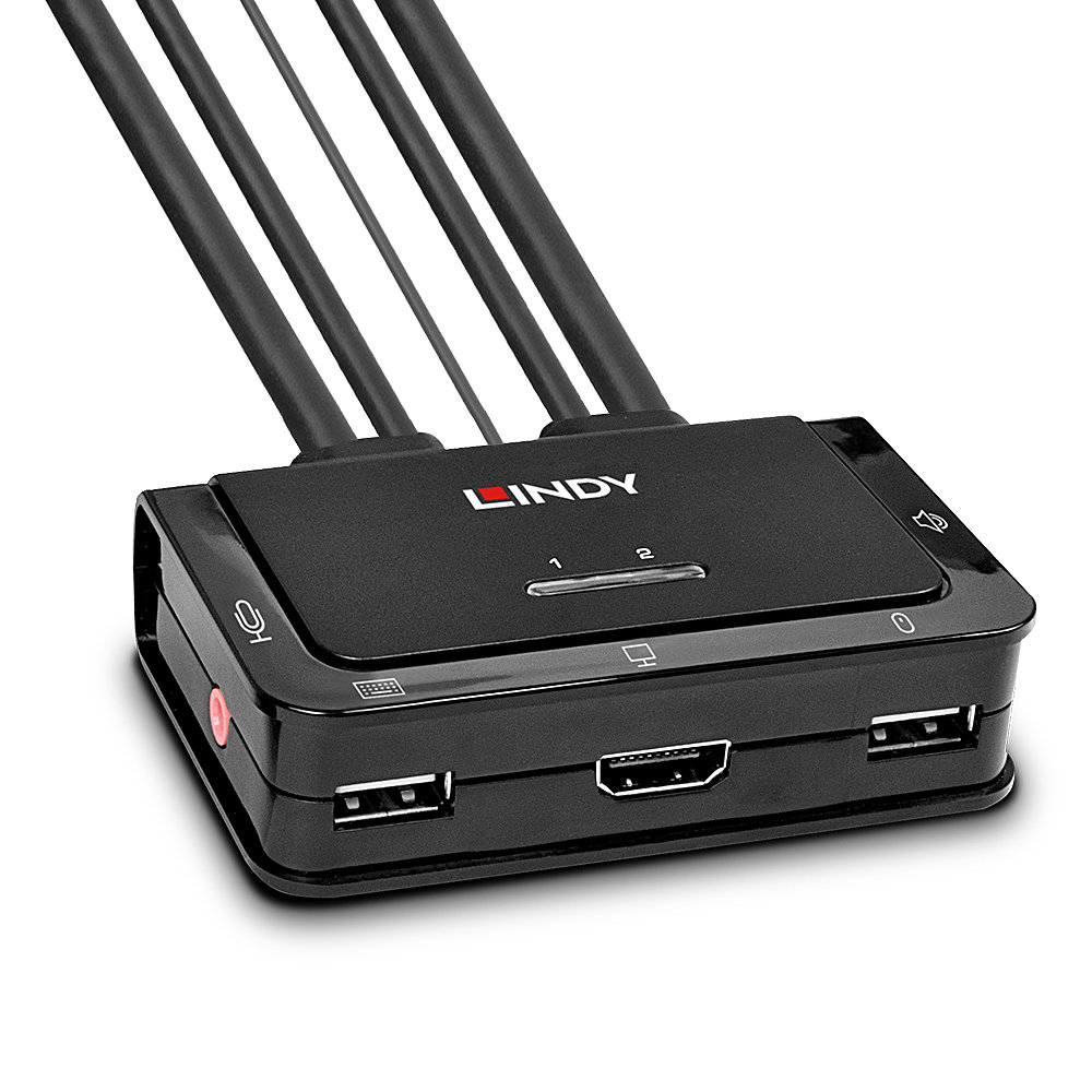 Un interruptor Lindy negro con cables. Tiene puertos USB, HDMI y un micrófono. Los cables salen por la parte superior.