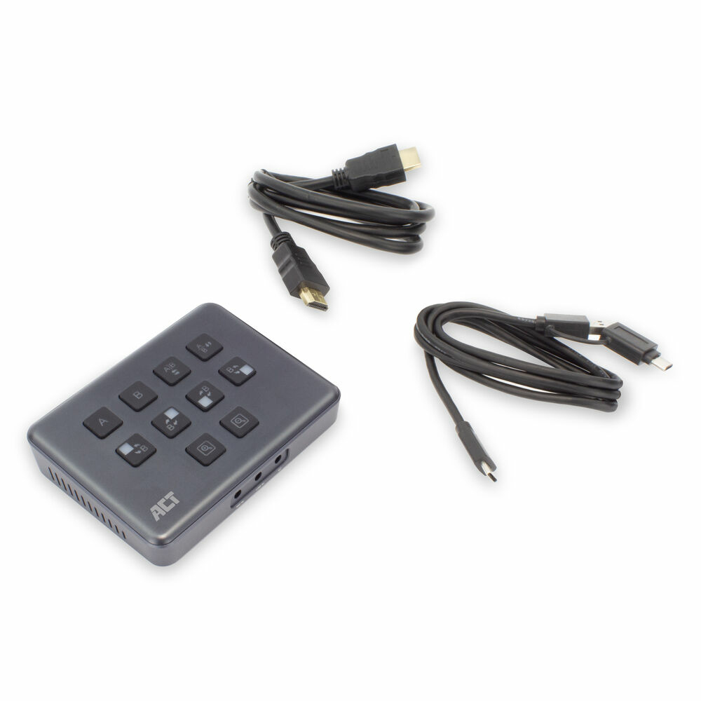 Ein graues ACT-Gerät mit Knöpfen, zwei schwarze HDMI-Kabel und ein schwarzes USB-Kabel liegen auf einer weißen Oberfläche.