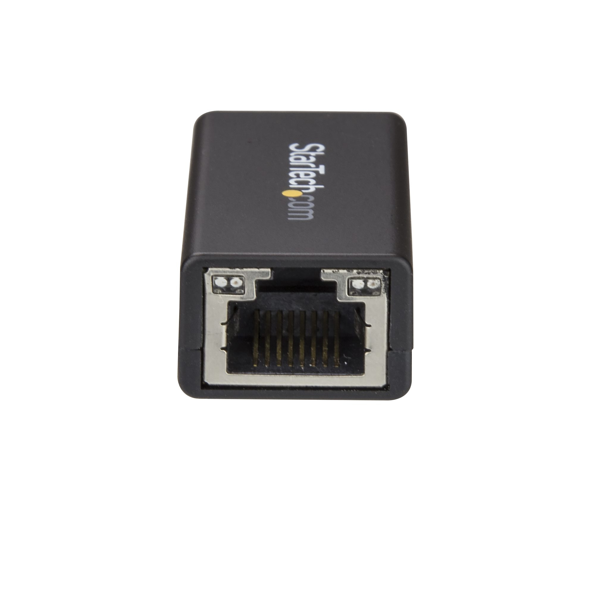 Adaptateur Ethernet StarTech noir sur fond blanc. Port RJ45 visible. Le nom de la marque est en haut.