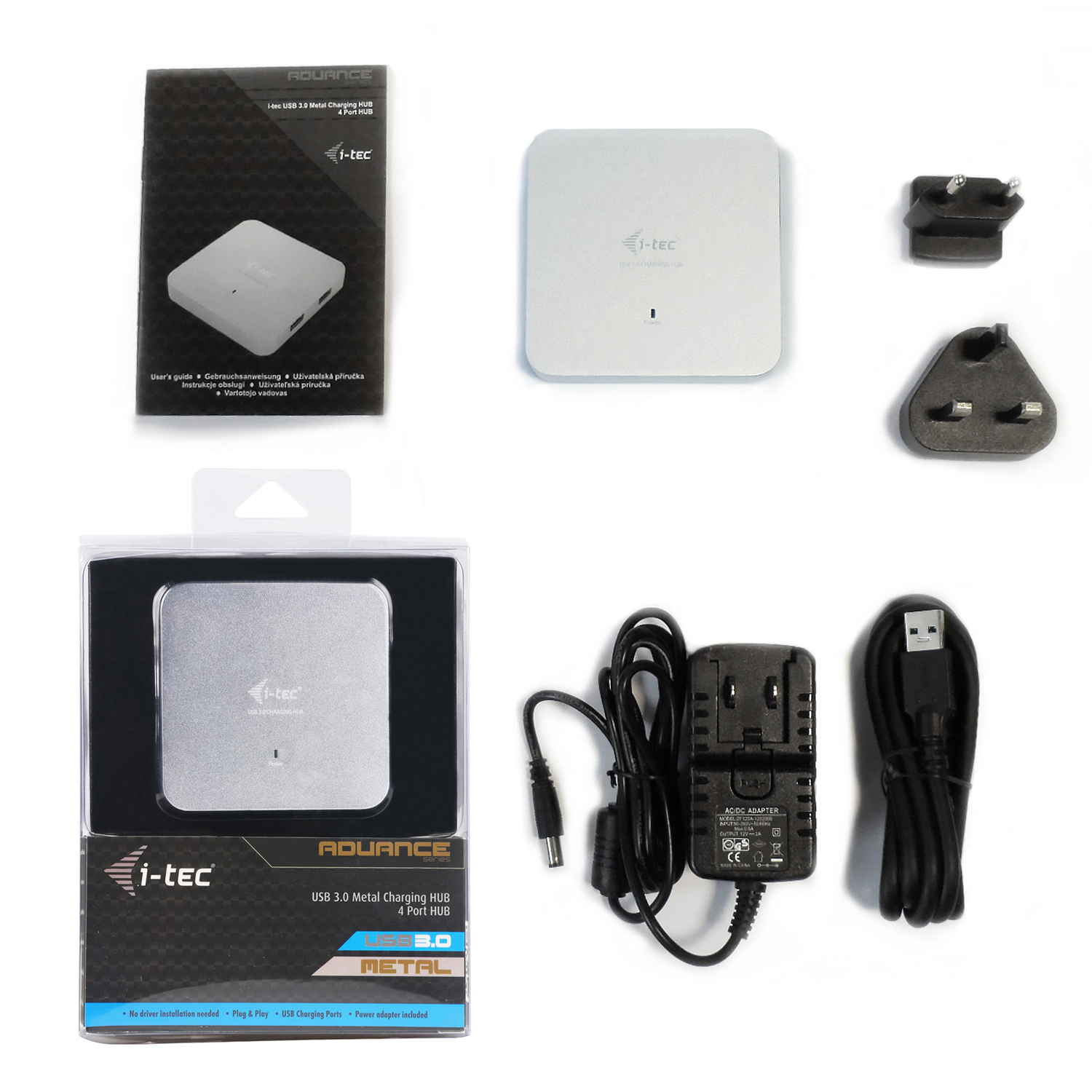 Ein i-tec USB 3.0 Metall-Ladehub mit Zubehör. Enthält eine Box, Netzadapter, Hub und Kabel auf weißem Untergrund.