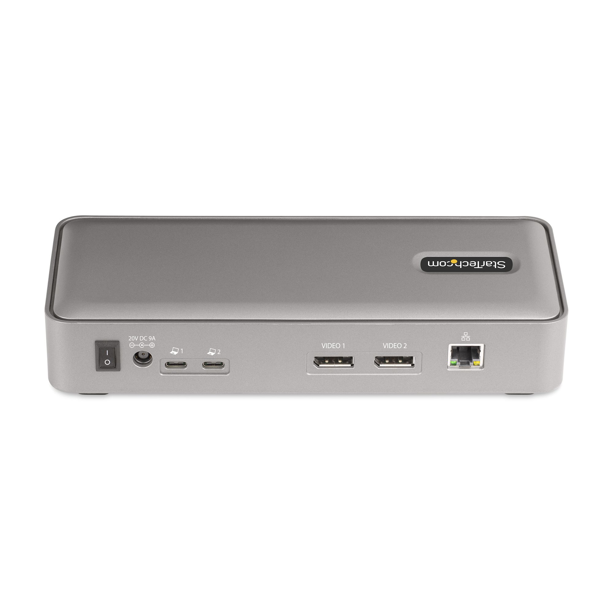 Graue StarTech-Dockingstation. Sie verfügt über verschiedene Anschlüsse, darunter Video und Ethernet, sowie einen Einschaltknopf.