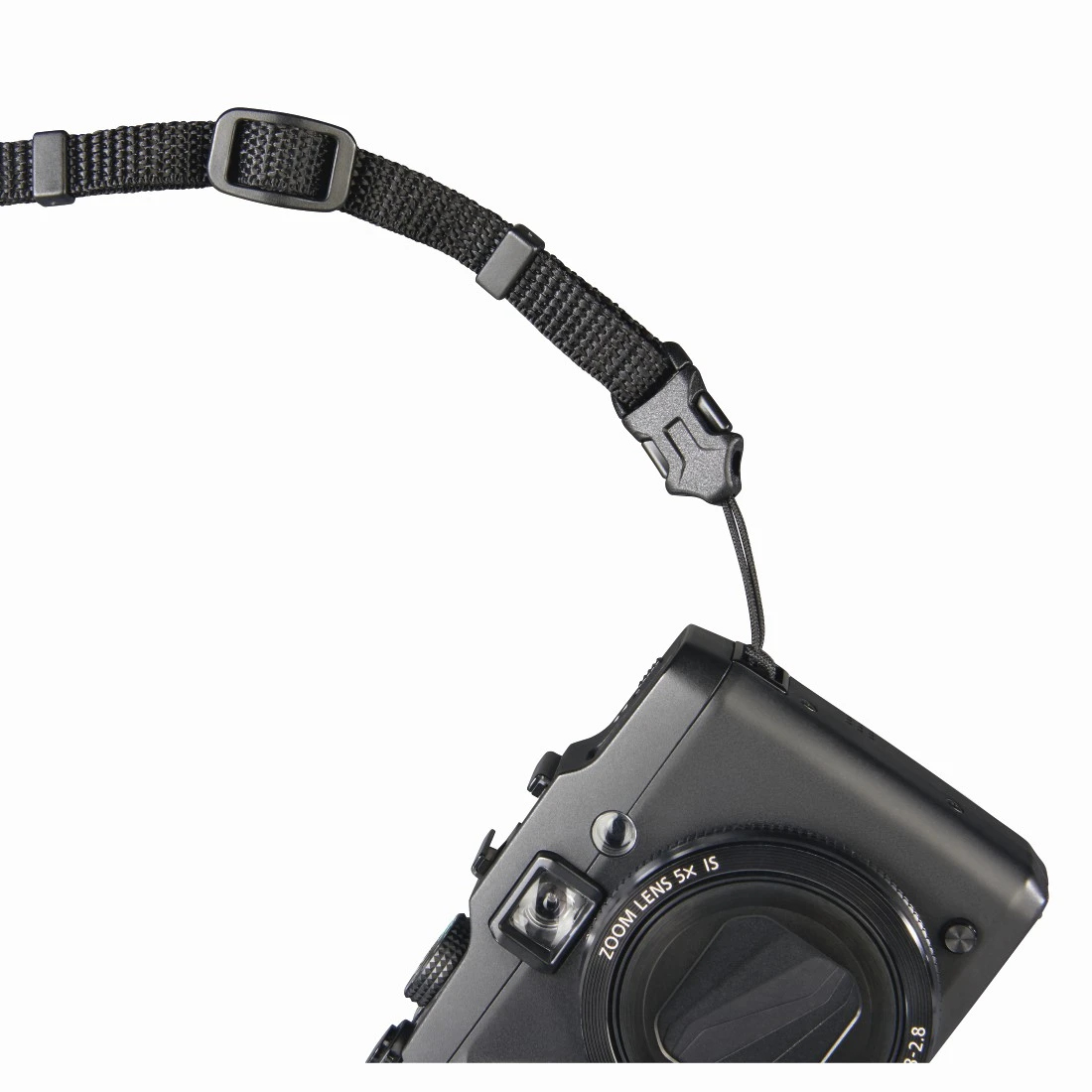 Schwarze Digitalkamera mit Handschlaufe. Die Schlaufe ist schwarz und mit der Kamera verbunden. Die Kamera hat ein Zoomobjektiv.