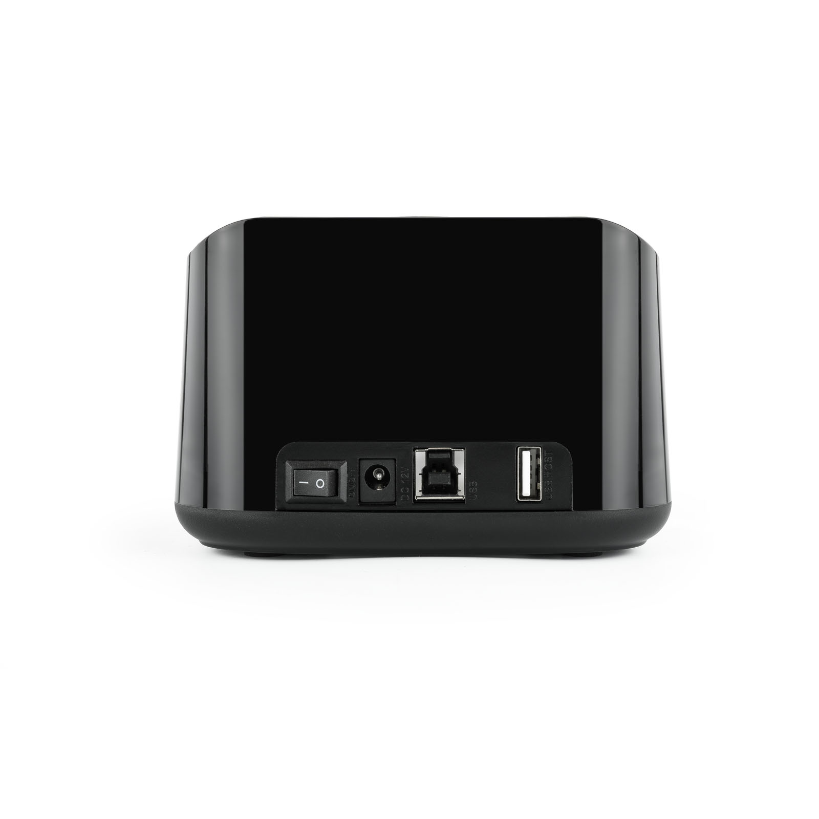 Dispositivo electrónico negro sobre fondo blanco. Presenta puertos, interruptor de encendido y diseño curvo y suave.