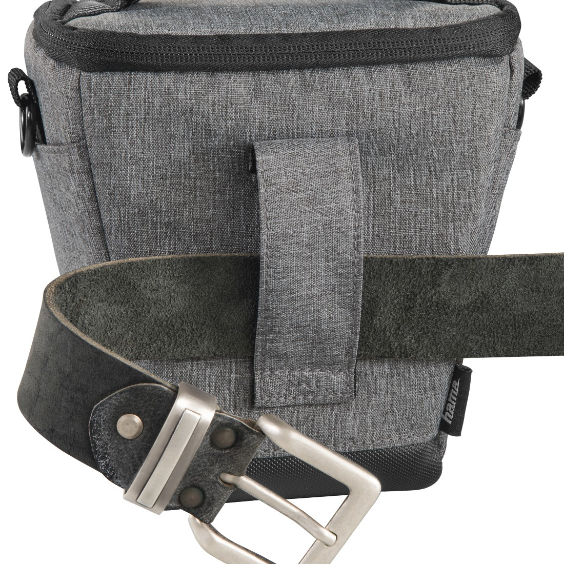 A gray camera bag with a black leather belt in front. The belt has a silver buckle. The bag has a black strap.