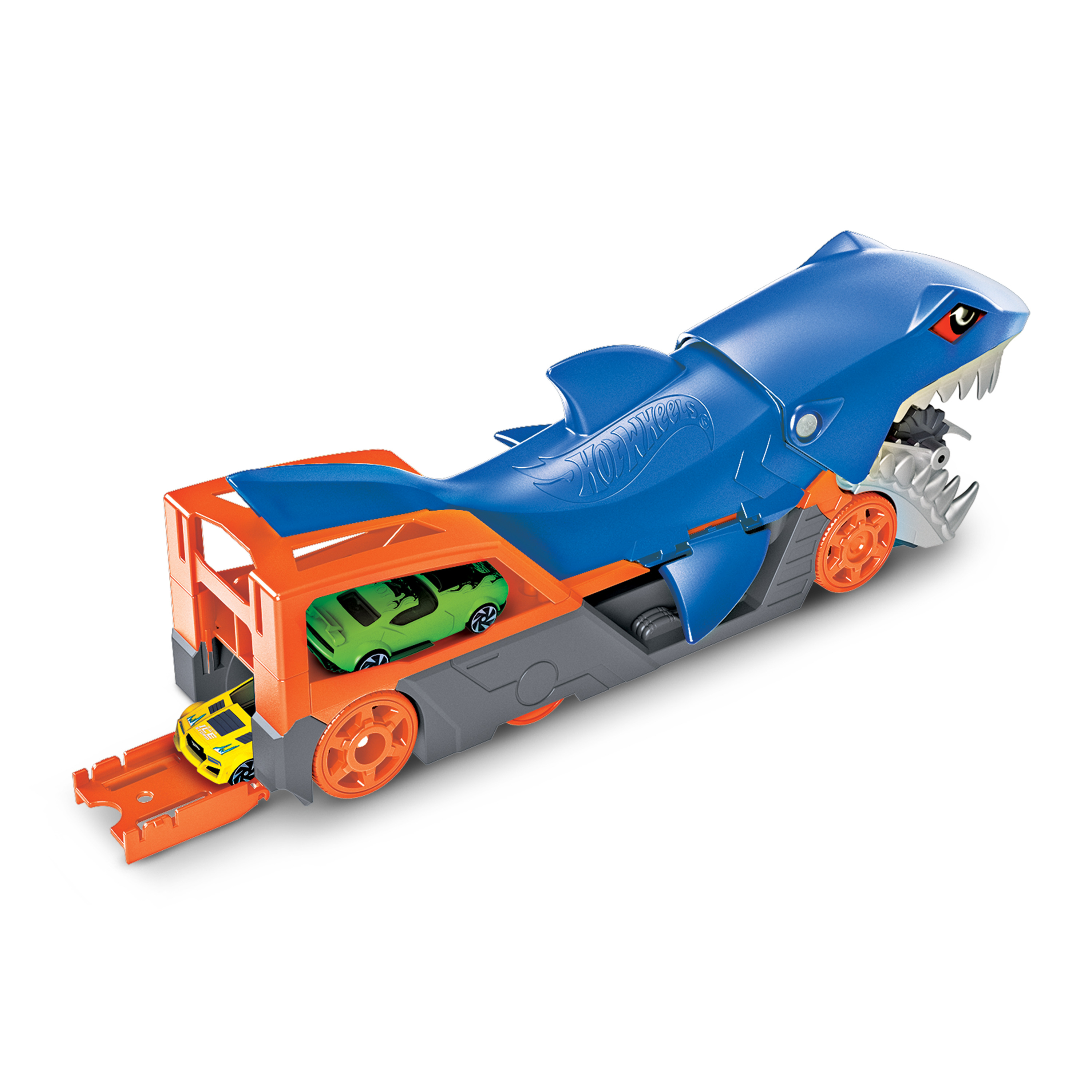 Transporter samochodowy Hot Wheels w kształcie rekina z zabawkami. Żółty samochód na rampie, dwa w środku.