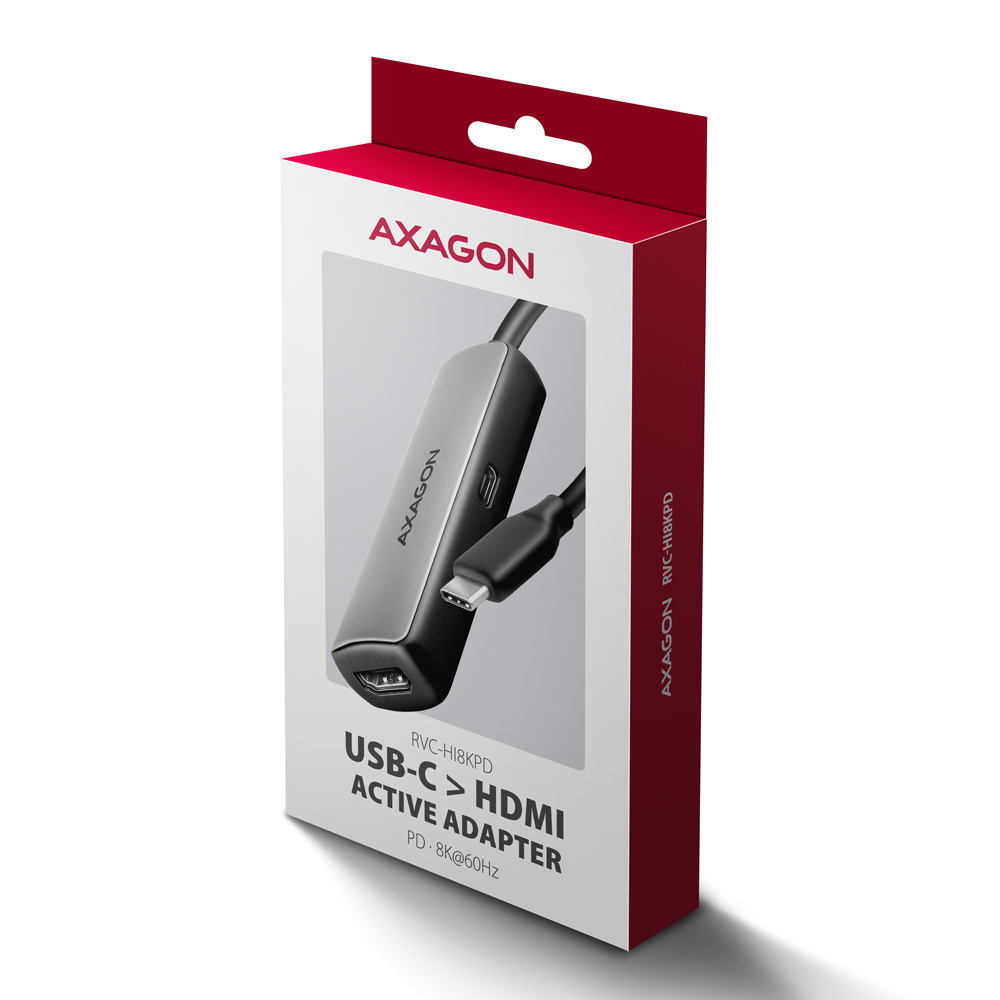 Pudełko z przejściówką USB-C na HDMI. Pudełko jest biało-czerwone, z marką 'AXAGON' i szczegółami produktu.