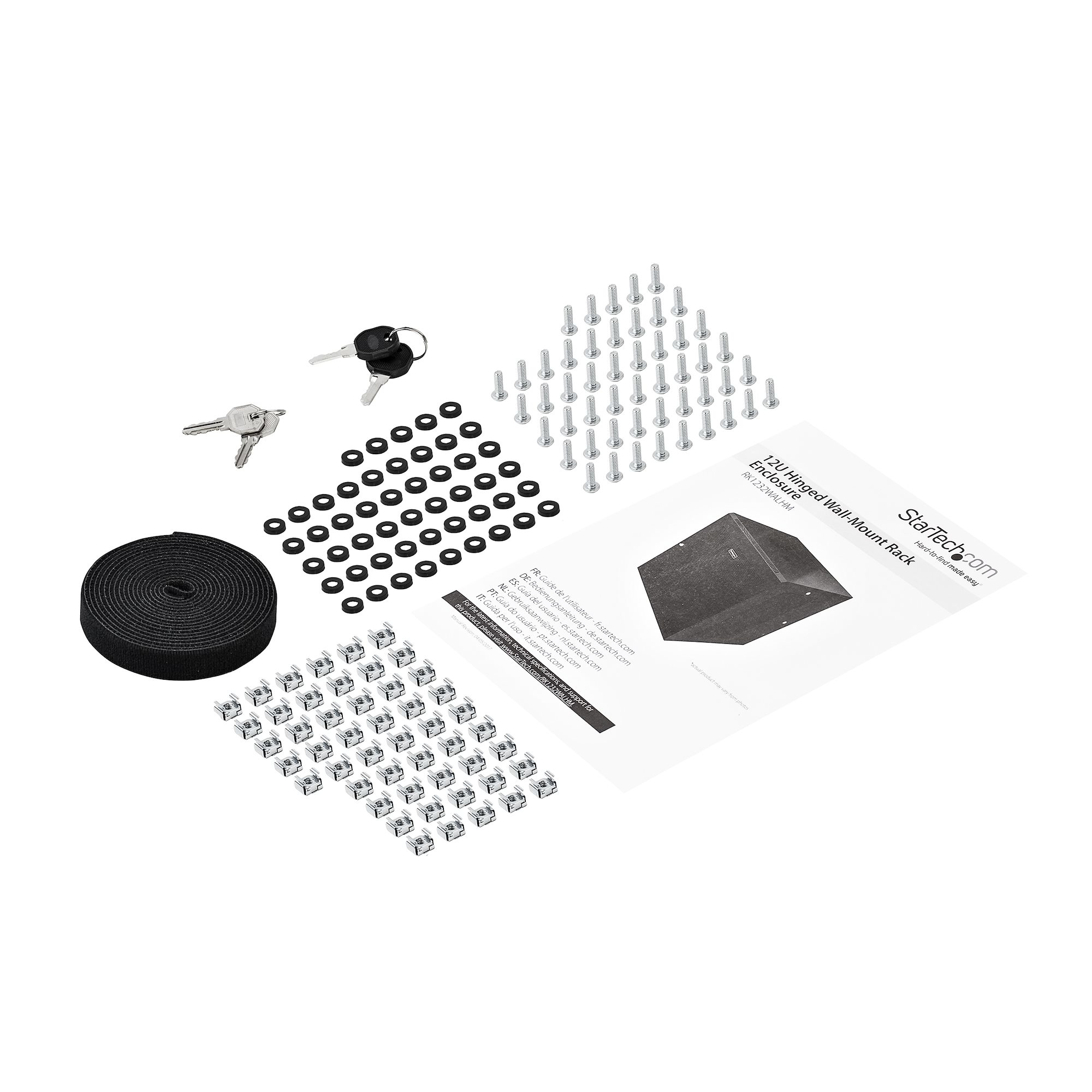 Una vista cenital muestra hardware, un manual, llaves y una correa negra. El fondo es blanco.
