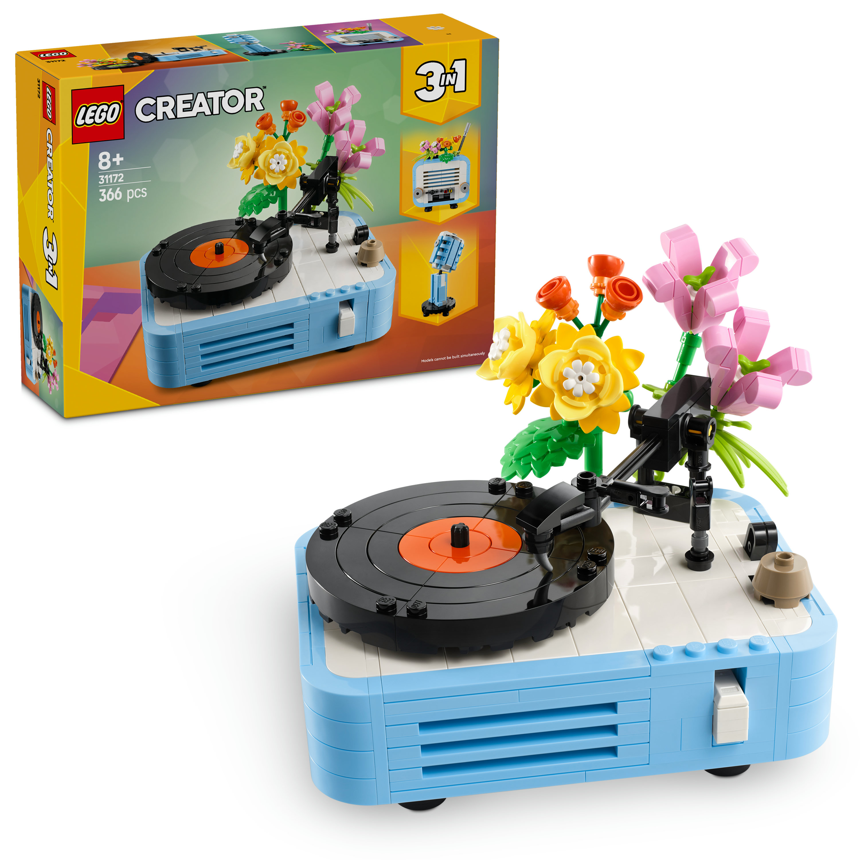 Lego Creator seti. Üzerinde çiçekler ve arka planda bir kutu bulunan mavi bir pikap.