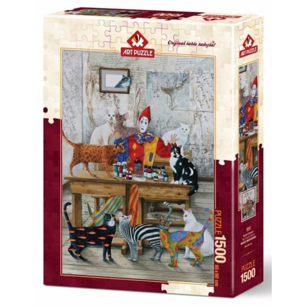 Palya kutusu, palya, kediler ve bir masa resminden oluşuyor. Kediler çeşitli desenlerle boyanmıştır. Kutuda 'ART PUZZLE' yazısı var.