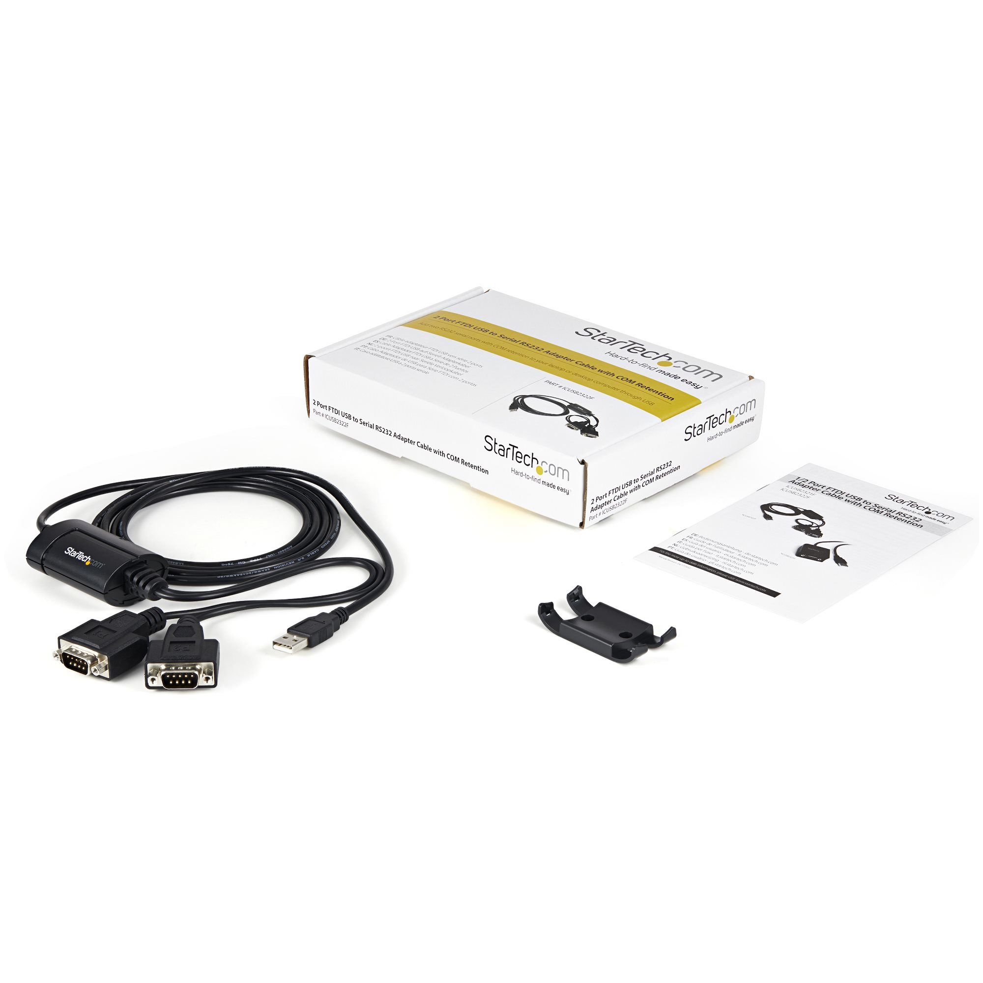 Ein StarTech-Adapterkabel. Schwarzes Kabel mit USB- und seriellen Anschlüssen, Box und Papierkram auf weißer Oberfläche.