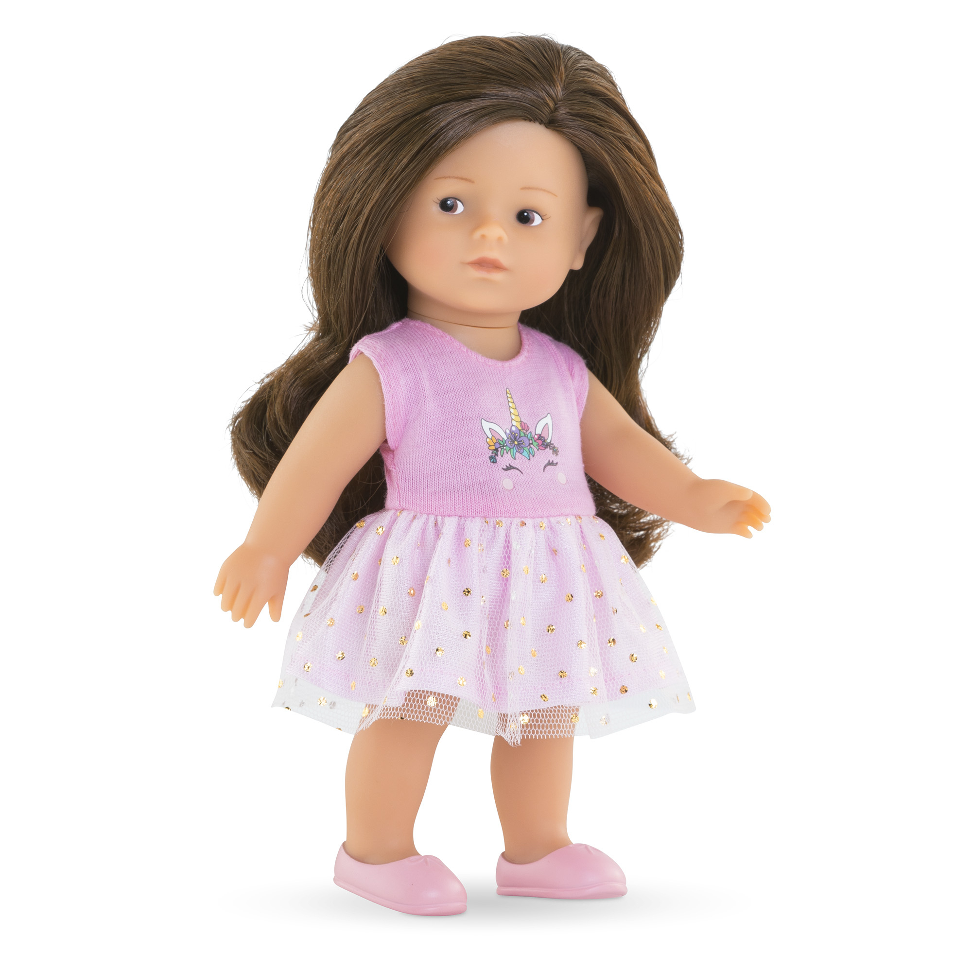 Puppe mit braunen Haaren, trägt ein rosa Einhornkleid und rosa Schuhe, steht vor weißem Hintergrund.