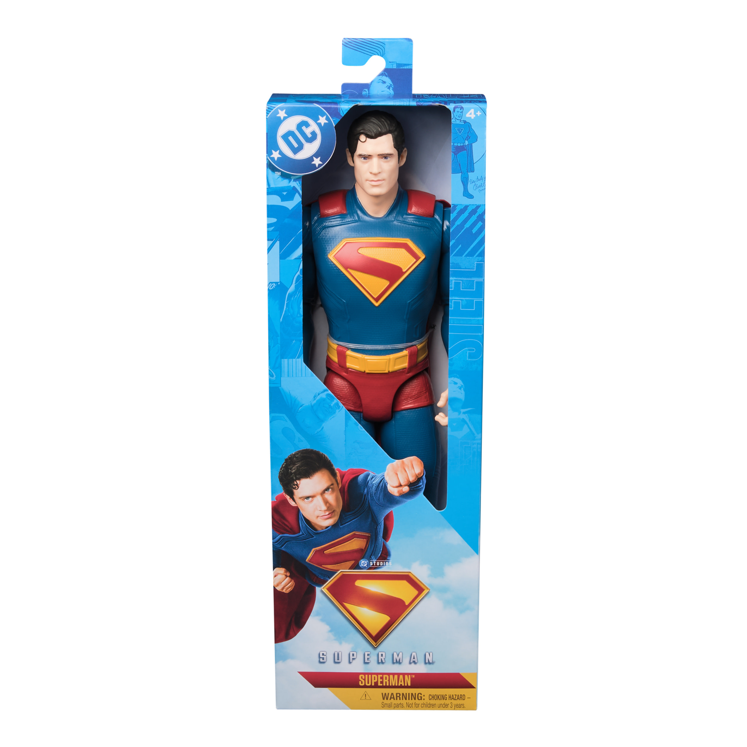 Una figura de acción de Superman con un traje azul y rojo está empaquetada en una caja con gráficos de Superman.