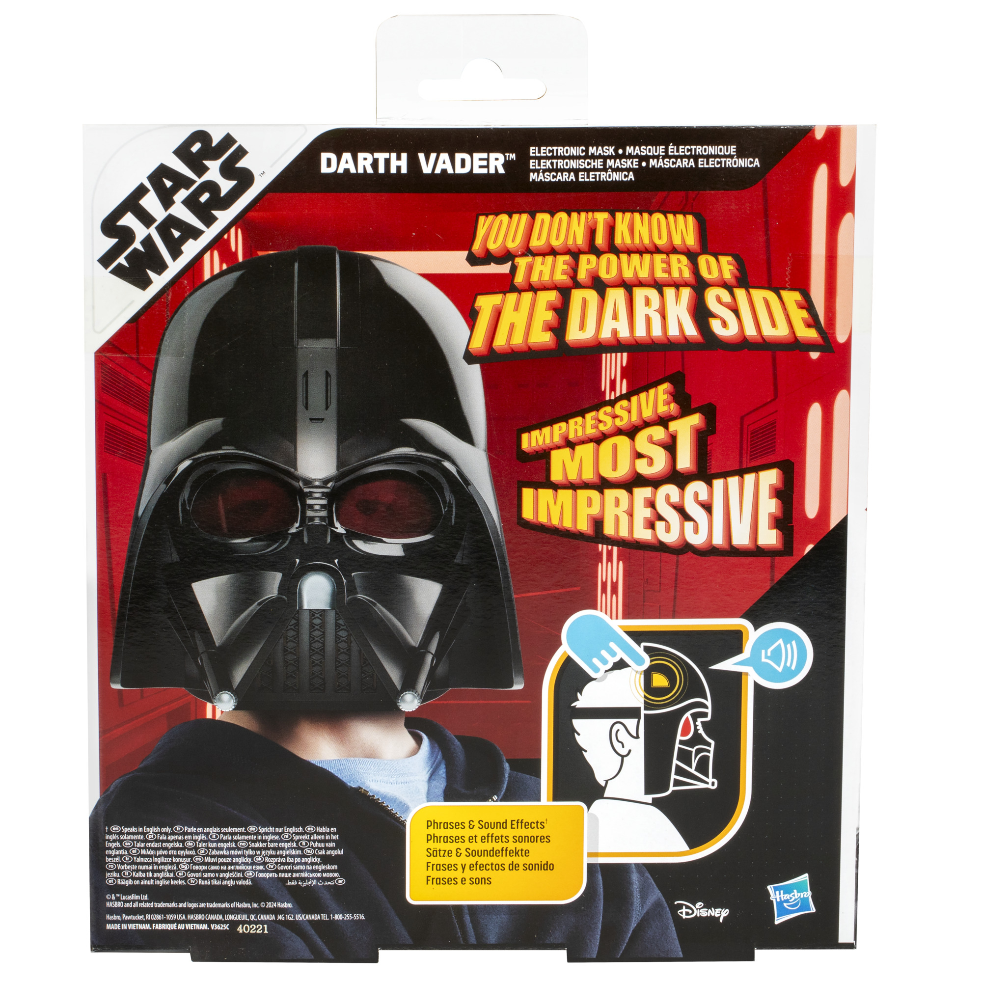 Máscara de Darth Vader en una caja de Star Wars. La máscara es negra y la caja tiene texto y gráficos rojos y blancos.