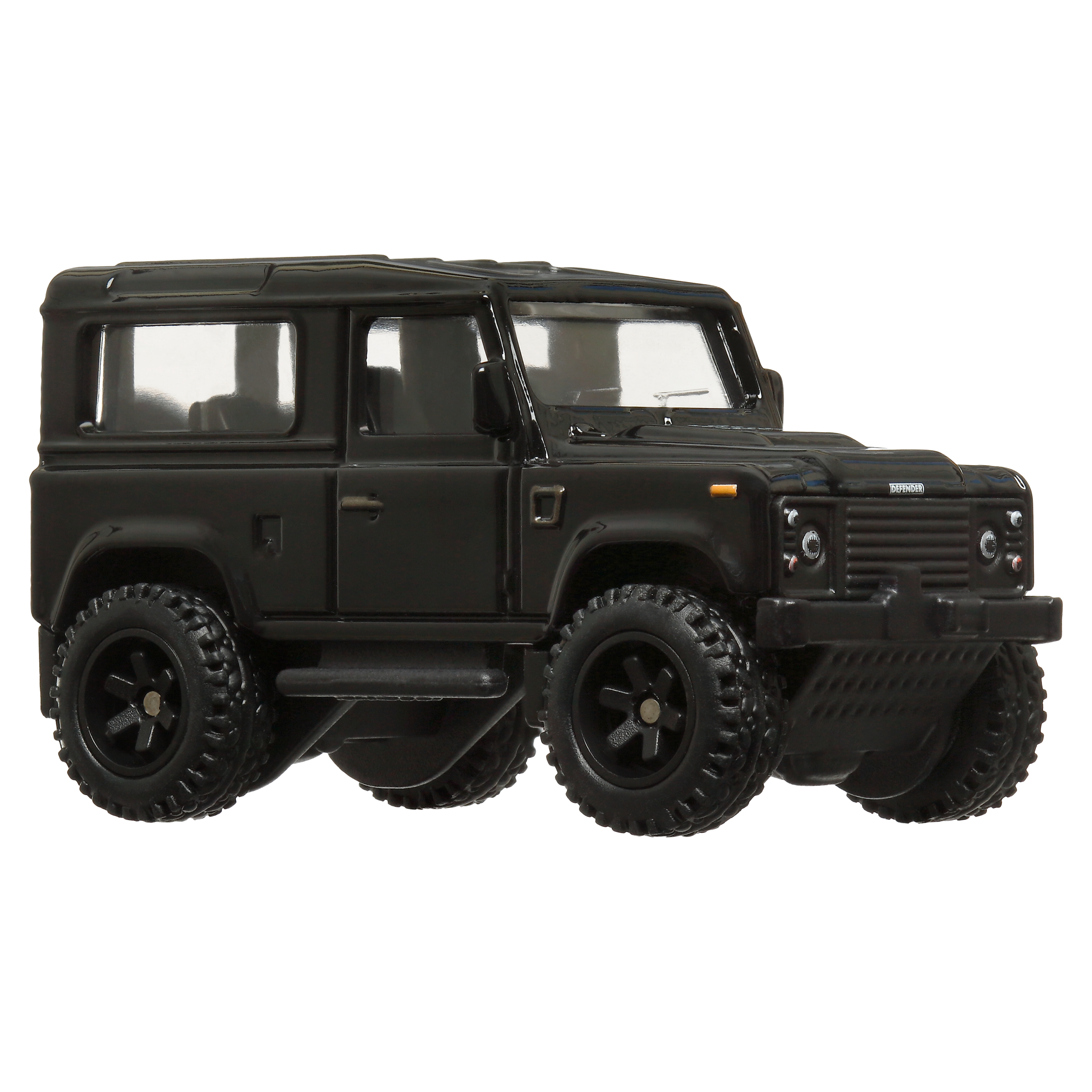 Czarny model Land Rover Defender na białym tle. Ma duże opony i szczegółowy design.